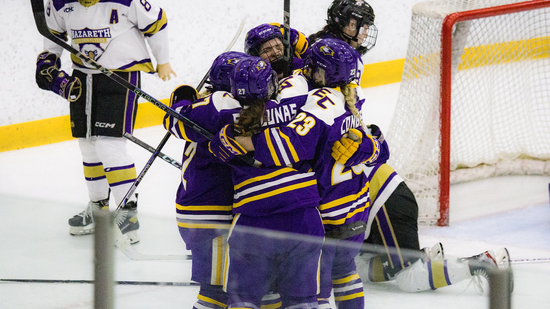 W. Ice Story Photo, 3.7.26, UCHC Champs