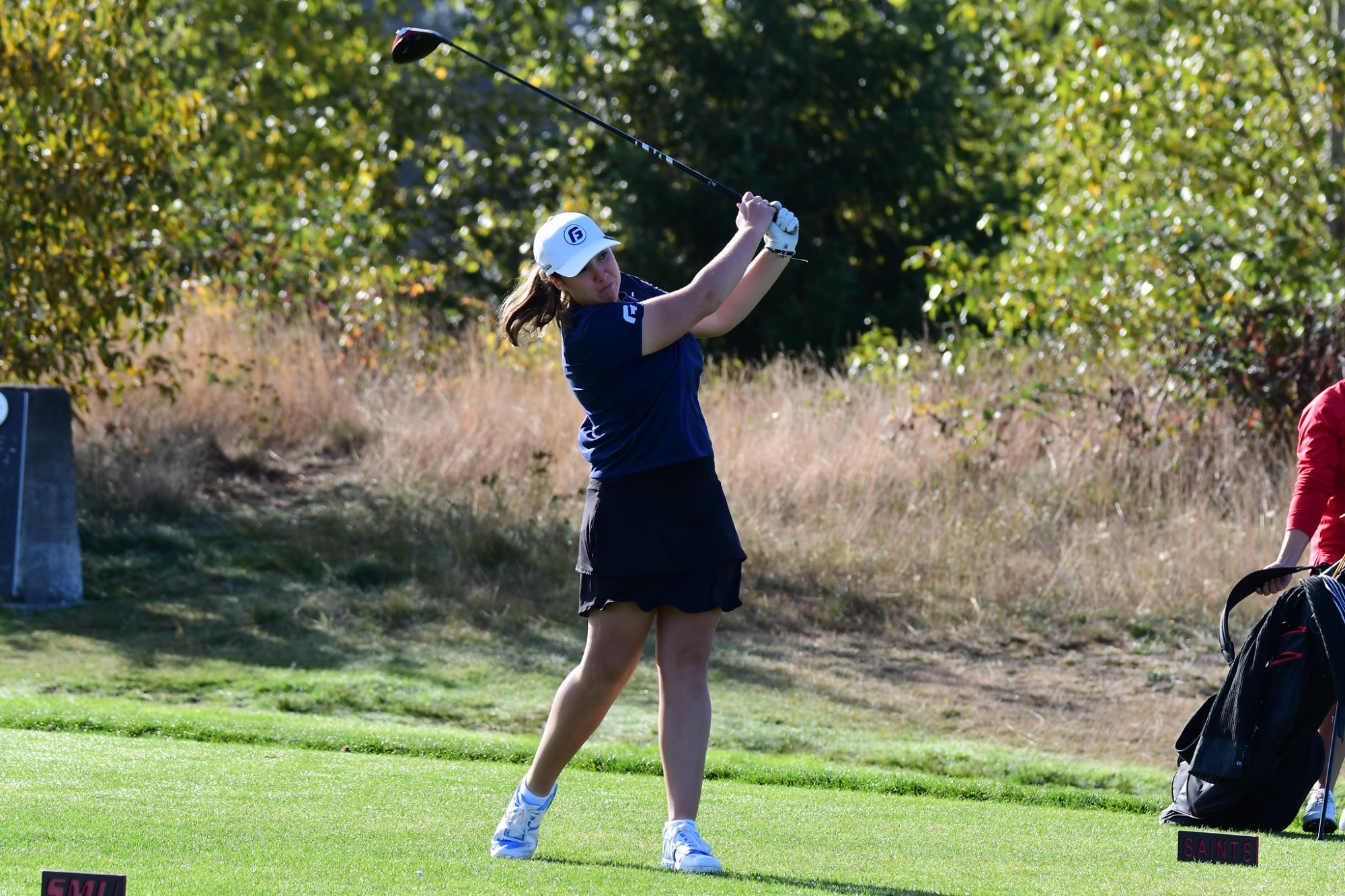 Ashlyn Johnson swings the ball
