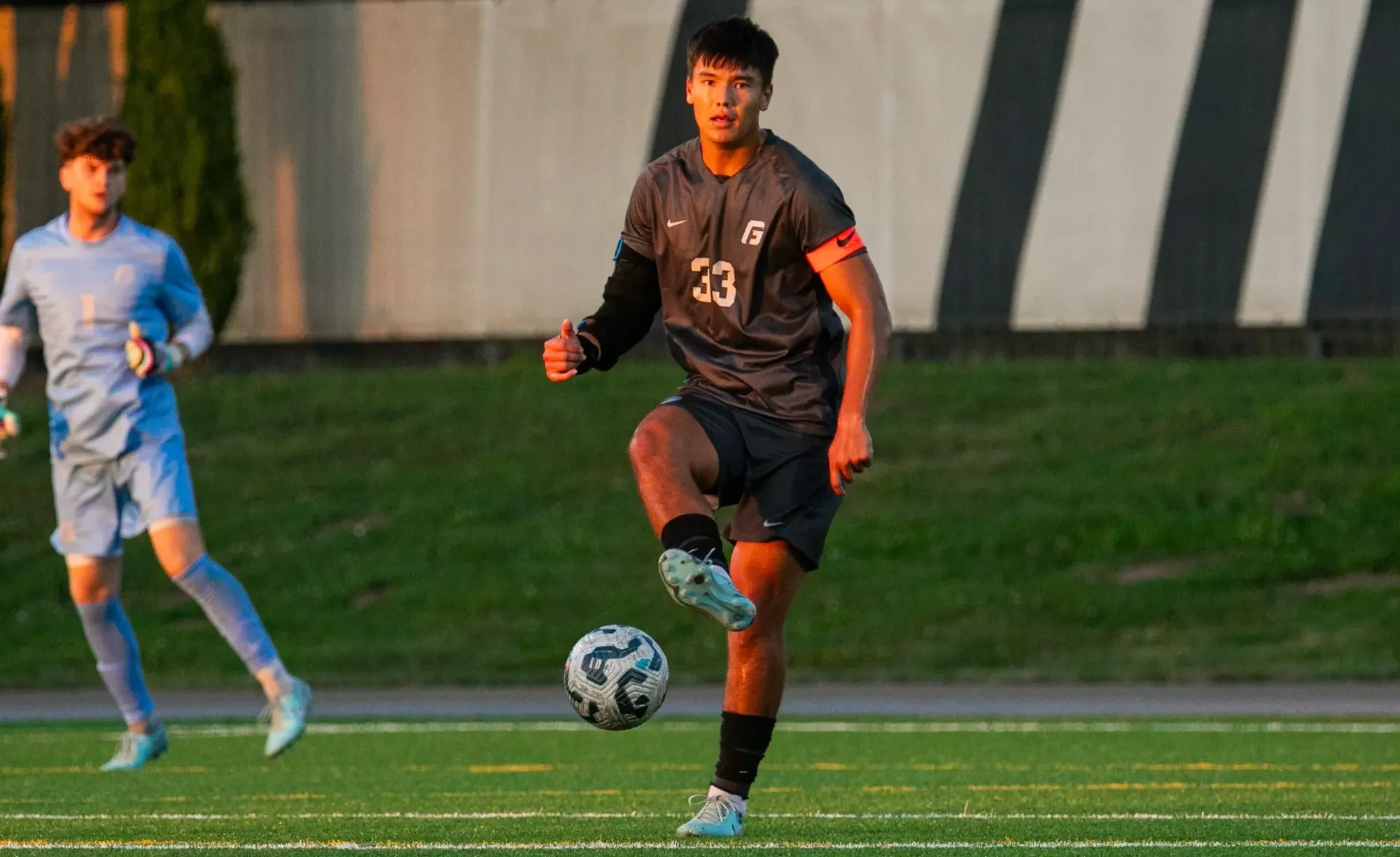 Kilinahe Waring mid action with soccer ball 