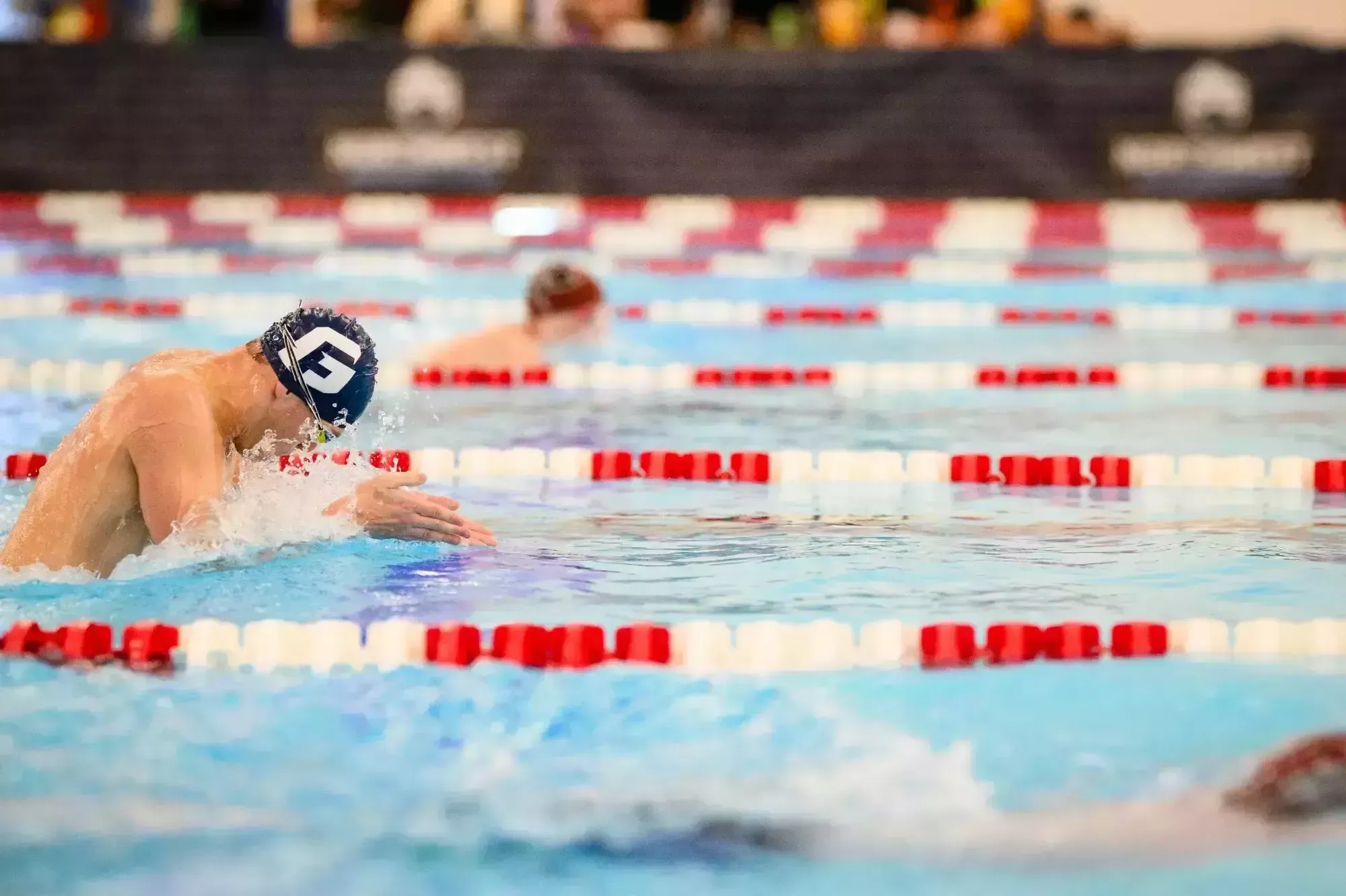 Swimmer doing motion above water 