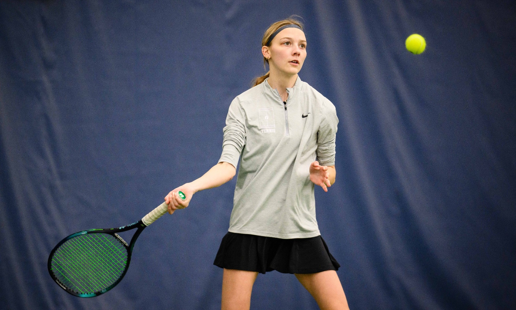Nicole Schnurbusch swings racket
