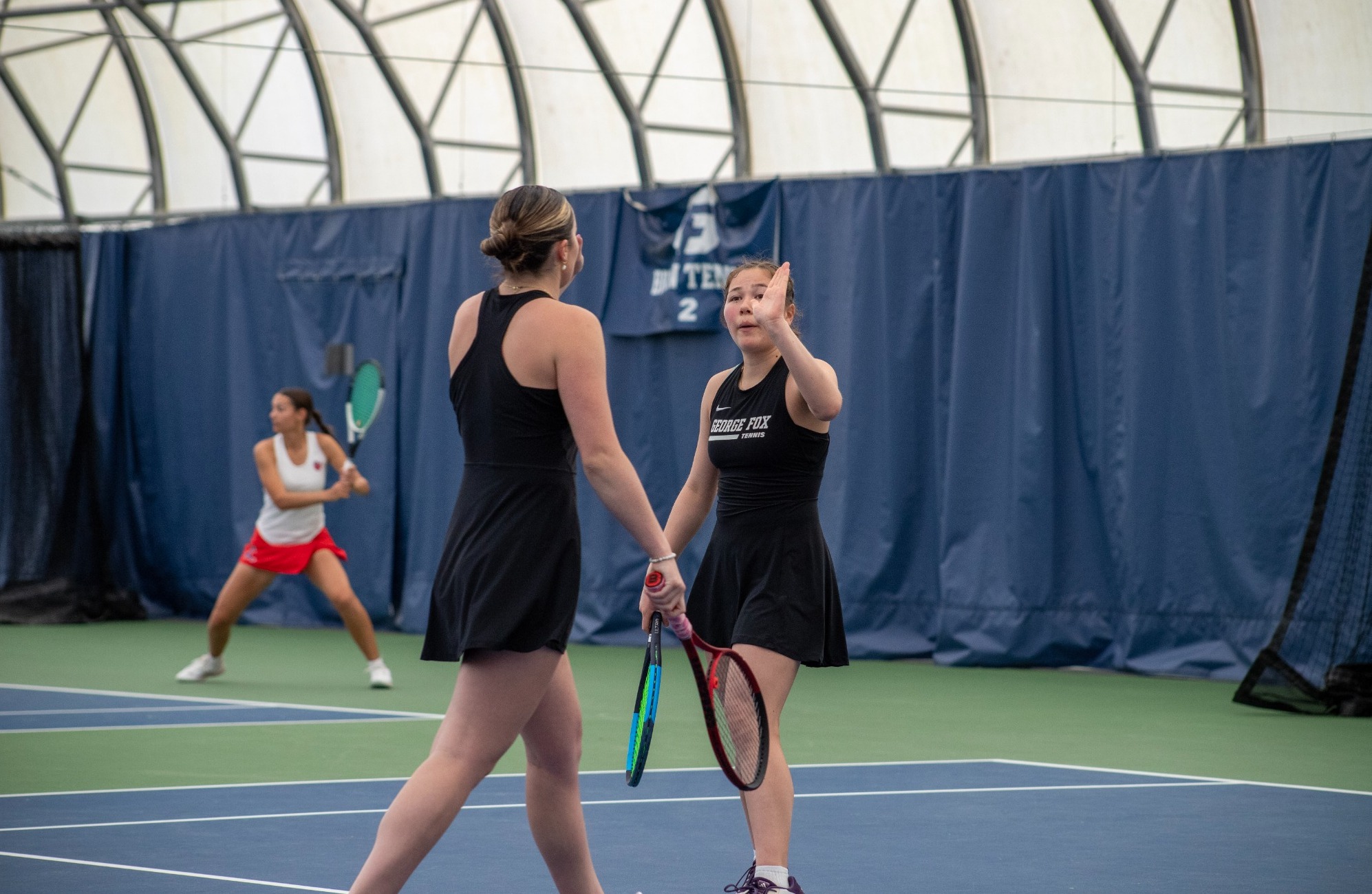 Shanah Denham high-fives Riley Bobkiewicz