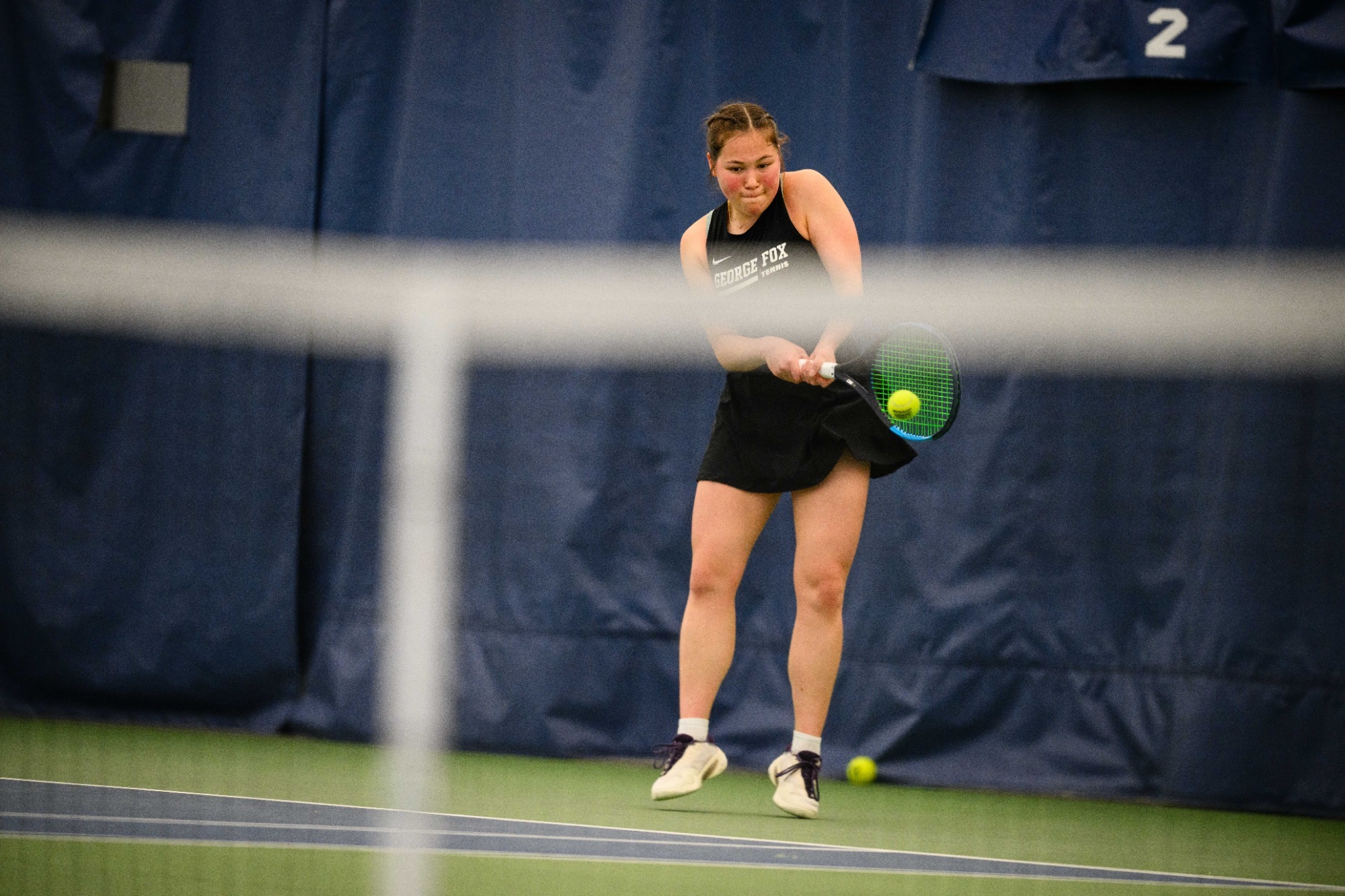 Shanah Denham hitting tennis ball