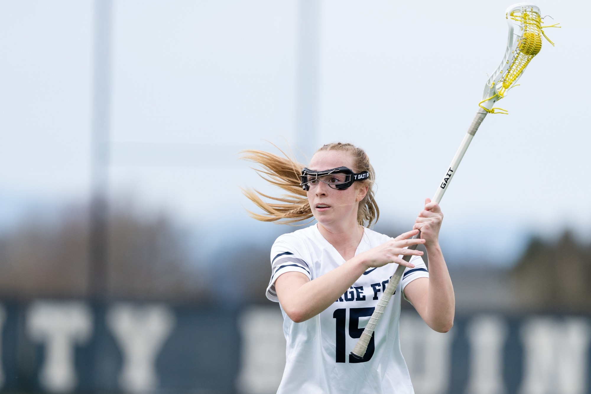 Ava Bluhm with stick in air