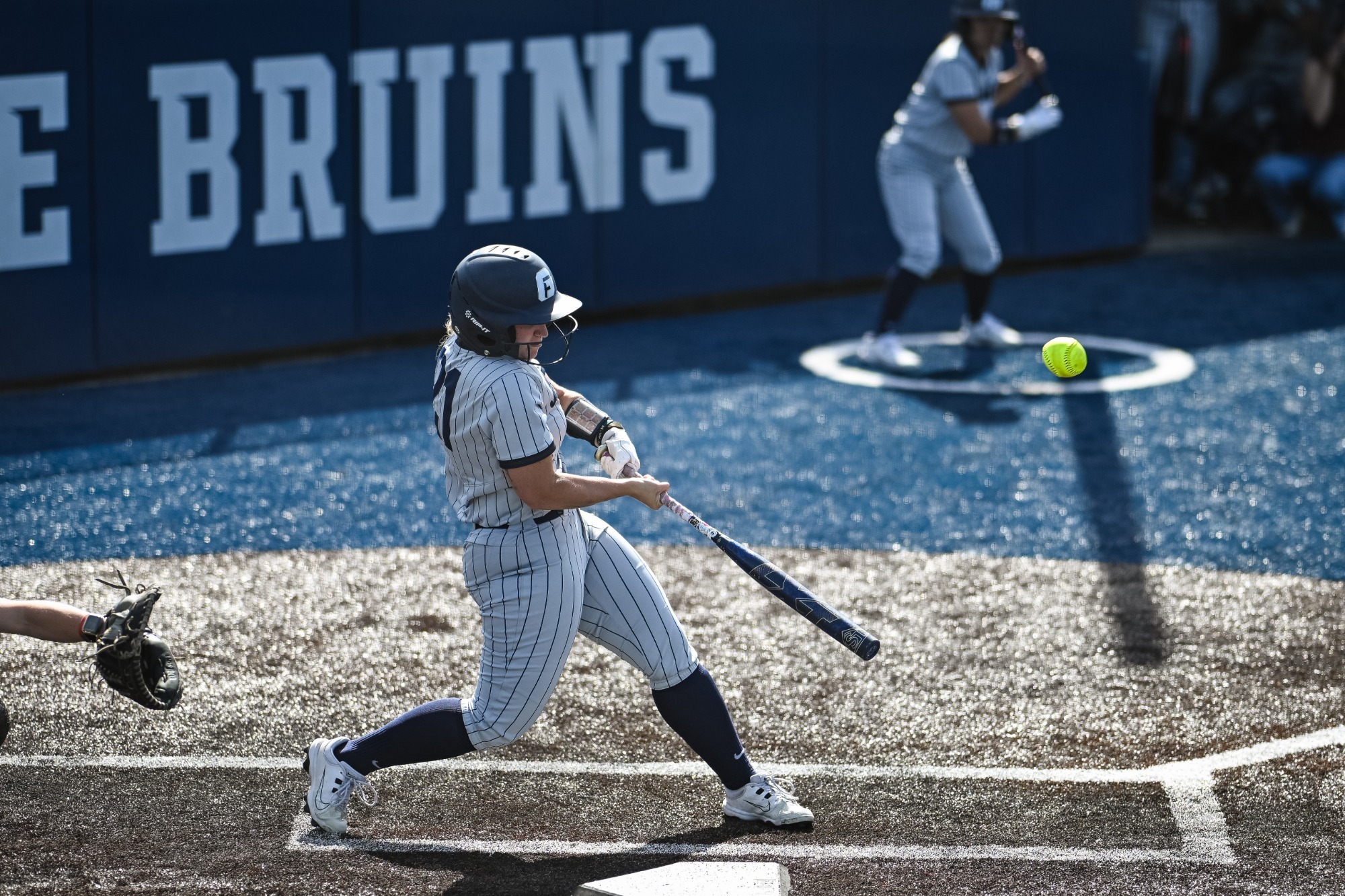 Emily Benavidez swings at home plate