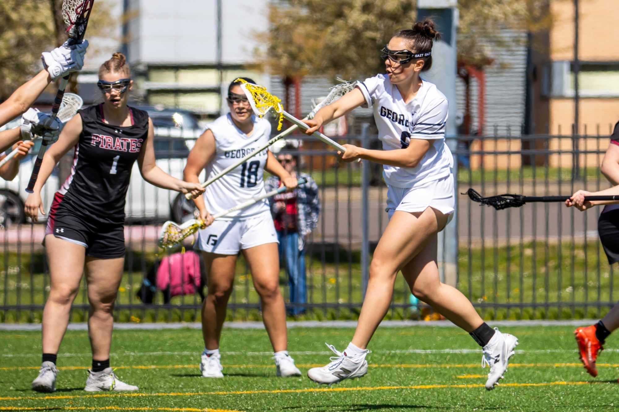 Sasha Thayer shoots on goal