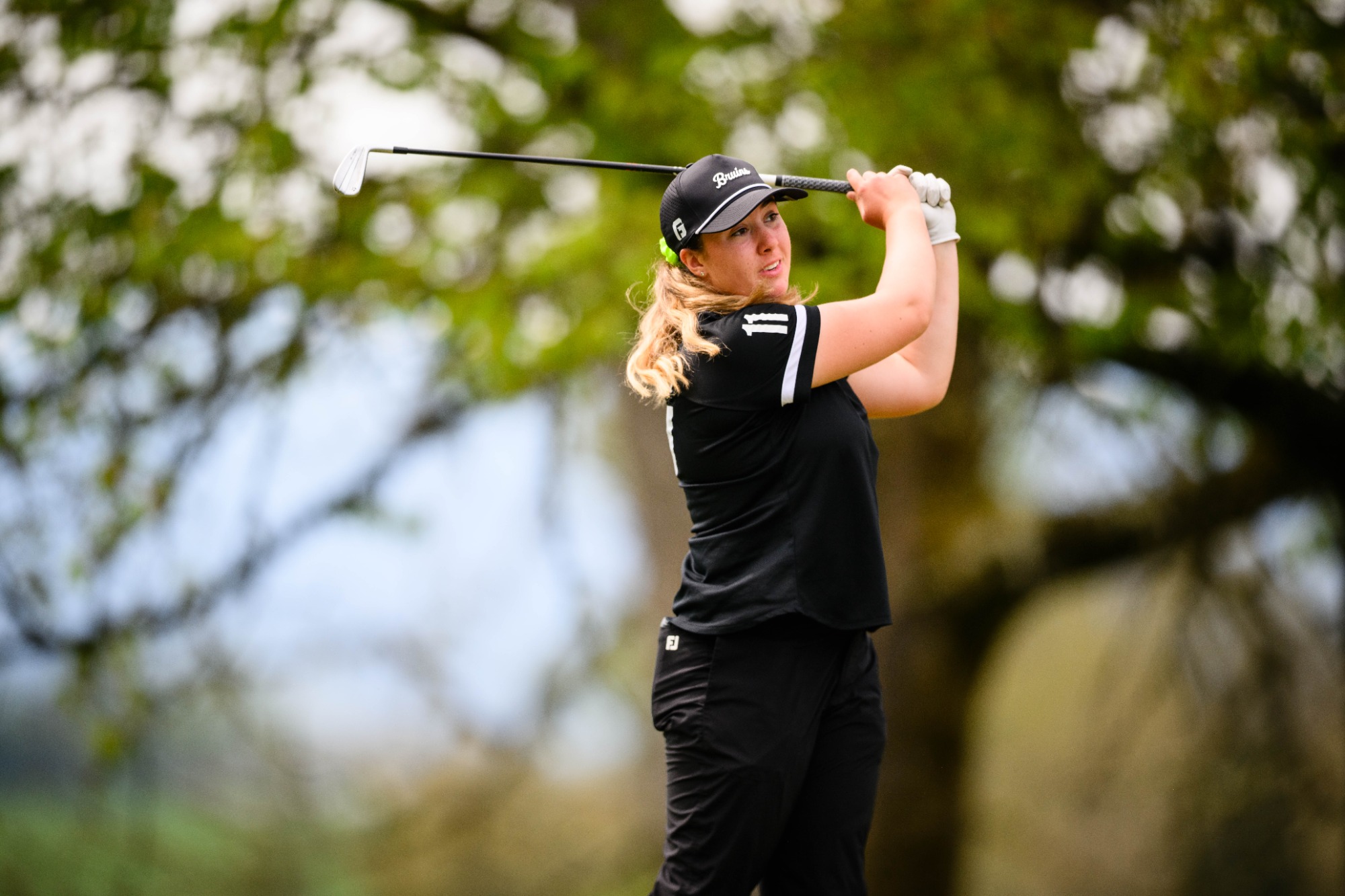 Ashlyn Johnson hitting the ball