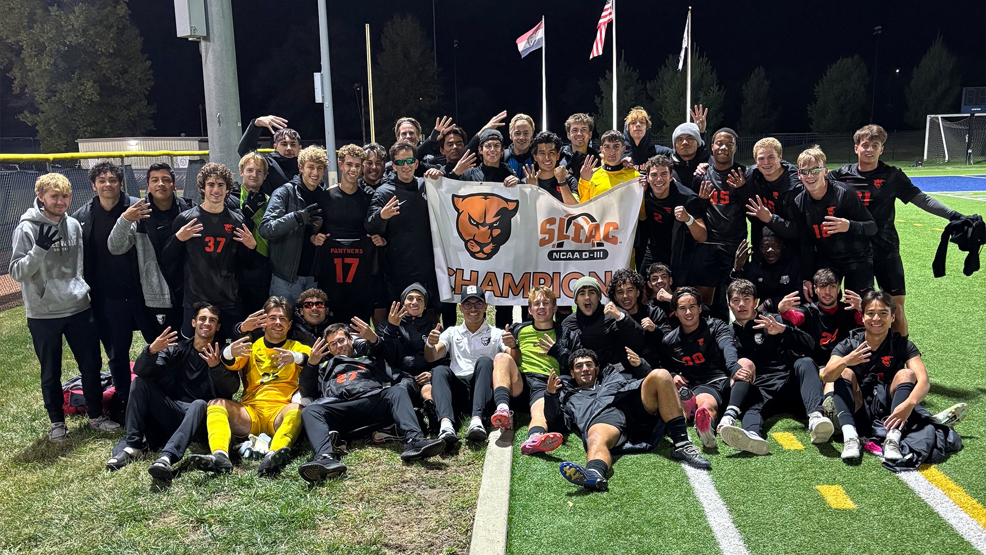 Team picture with SLIAC champion banner