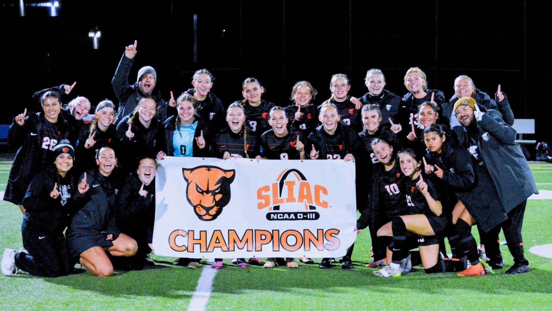 Team Picture holding SLIAC champion banner
