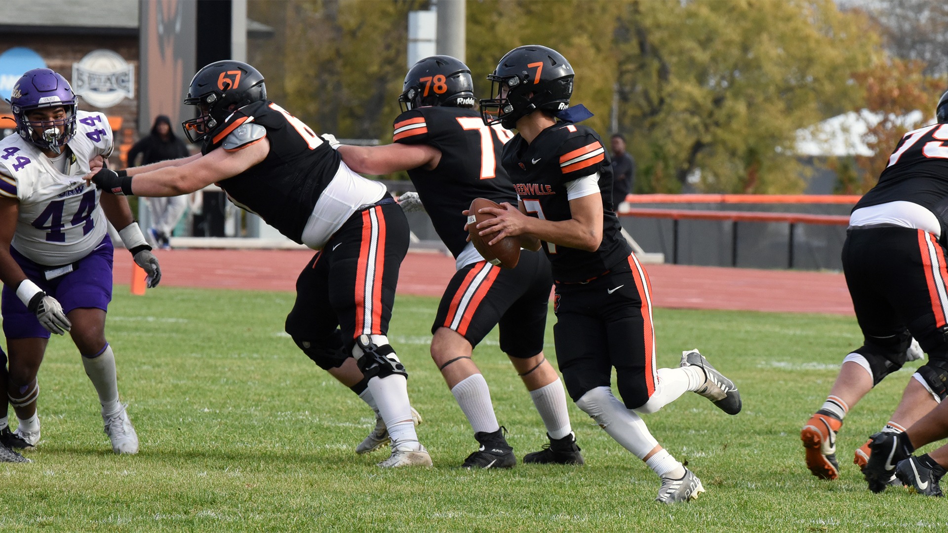 Wyatt Kile at QB in pocket with ball while GU O-Line blocks for him