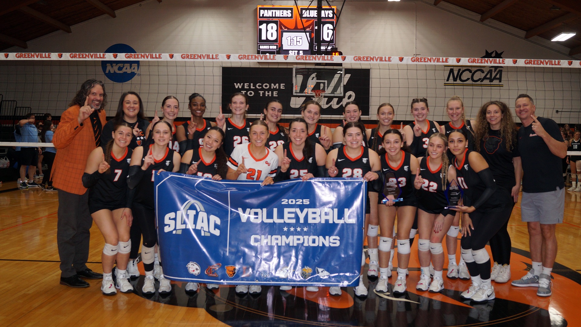 Team Picture holding SLIAC Champion banner after winning Championship 