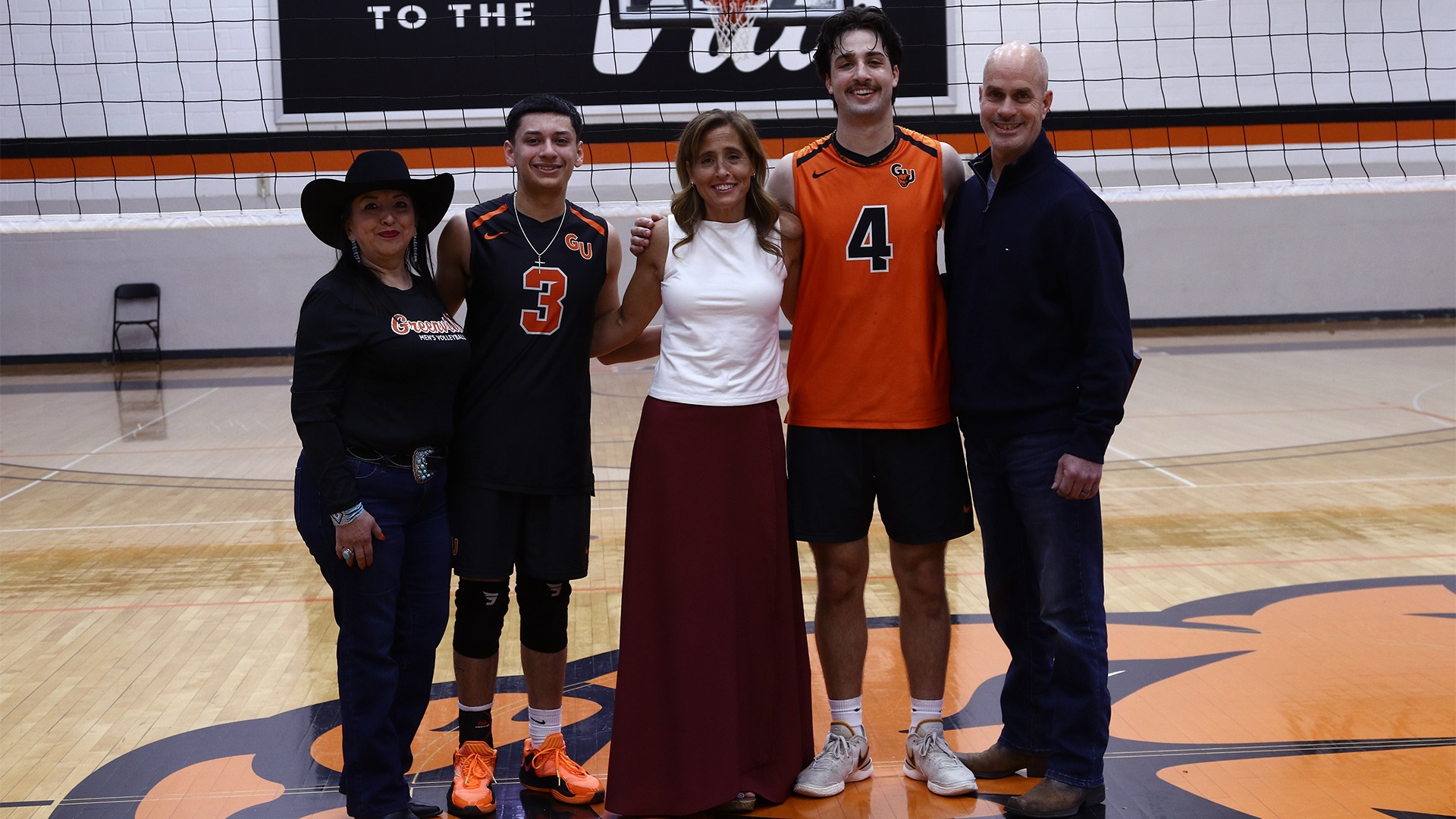 Group picture of Sam Molitor and Jay Ramirez and their parents