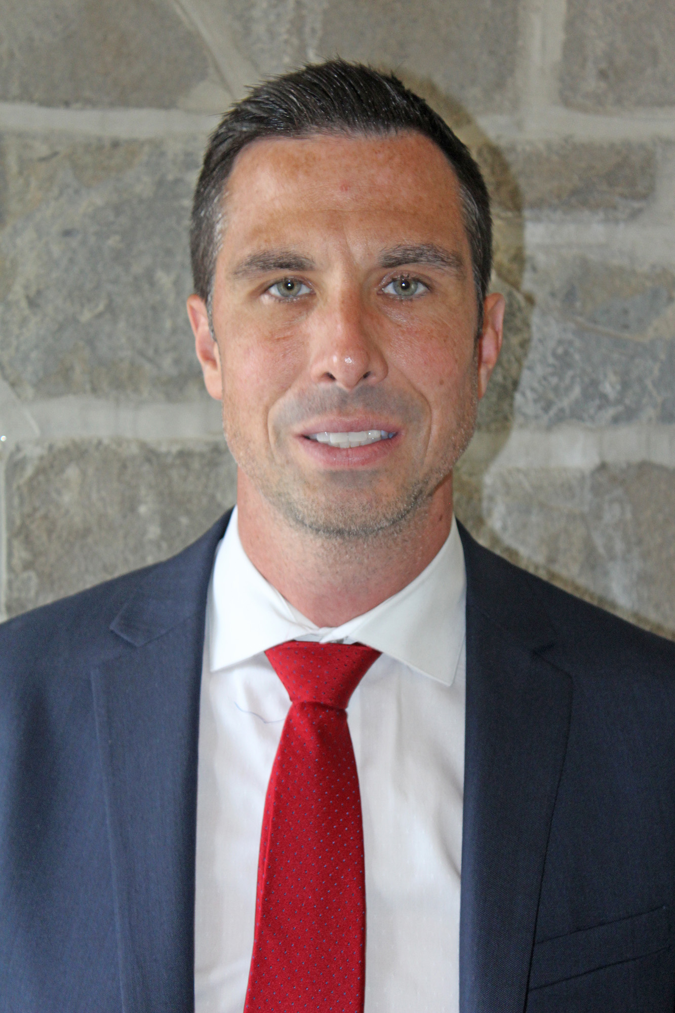 Peter Arsenault head men's tennis coach