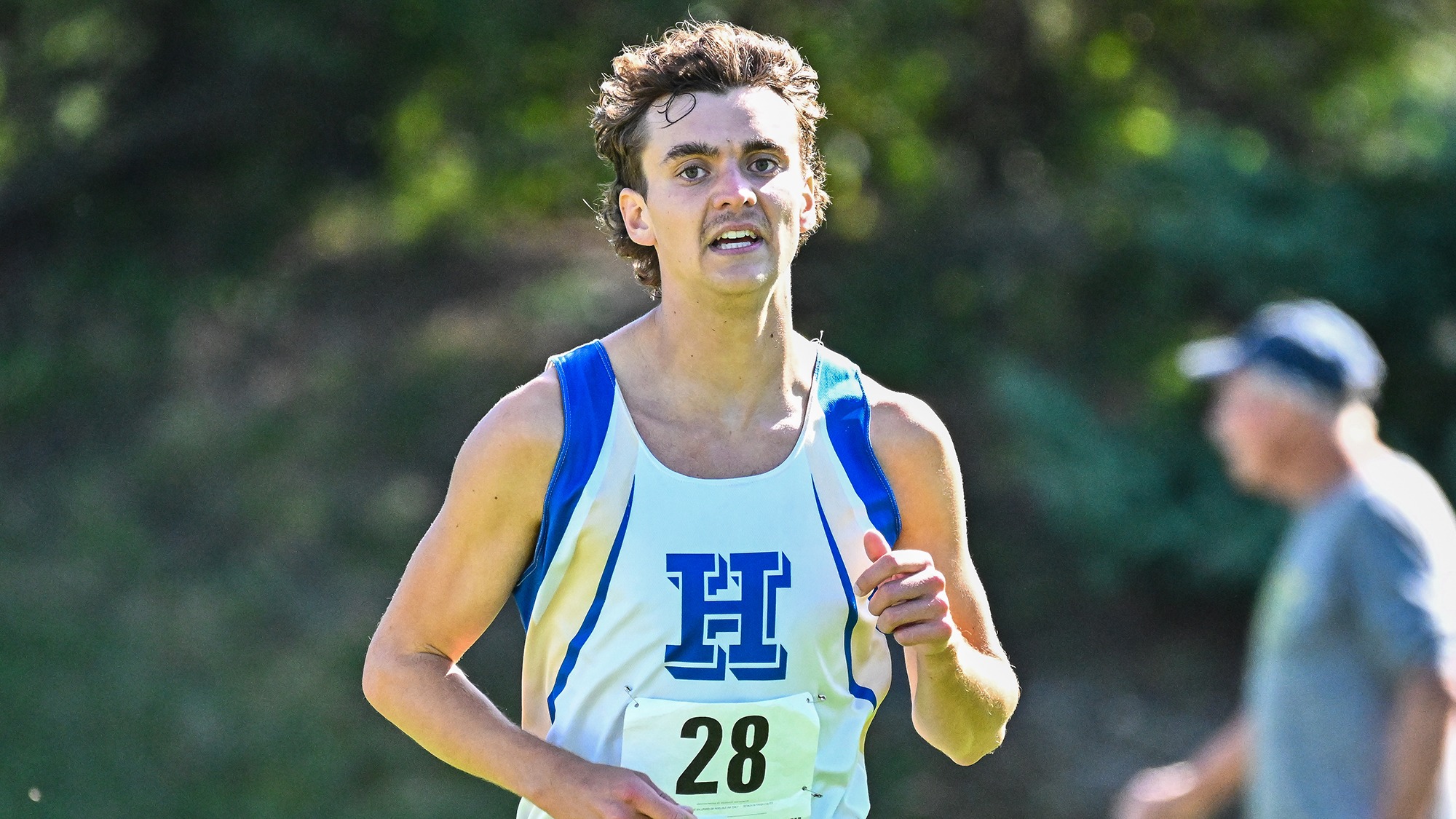 Liam Card approaches the finish line in the 2025 Hamilton Cross Country Invitational