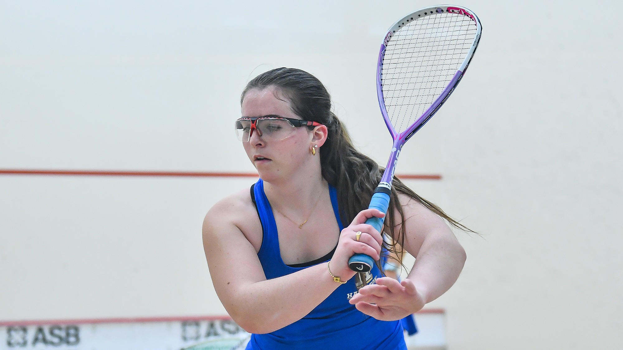 Kathryn Swords hits a return against her Williams opponent in November 2024