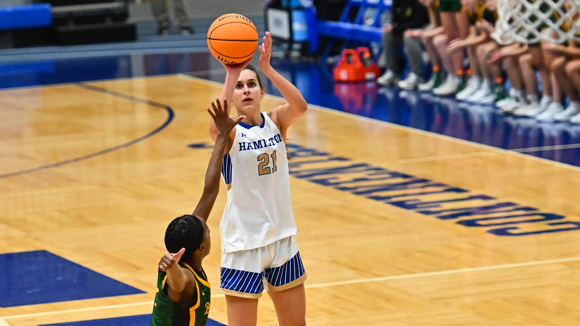 Kendall Harris takes a jump shot from the free-throw line against SUNY Brockport 