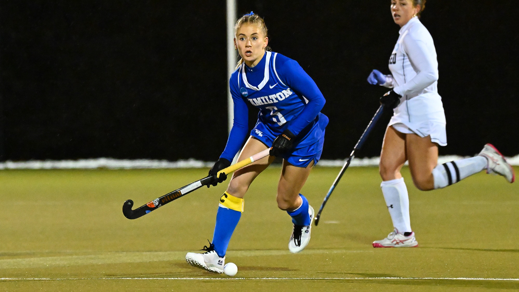 Lilly Truchon looks for a teammate to pass to in the NCAA first round field hockey game against SUNY Geneseo