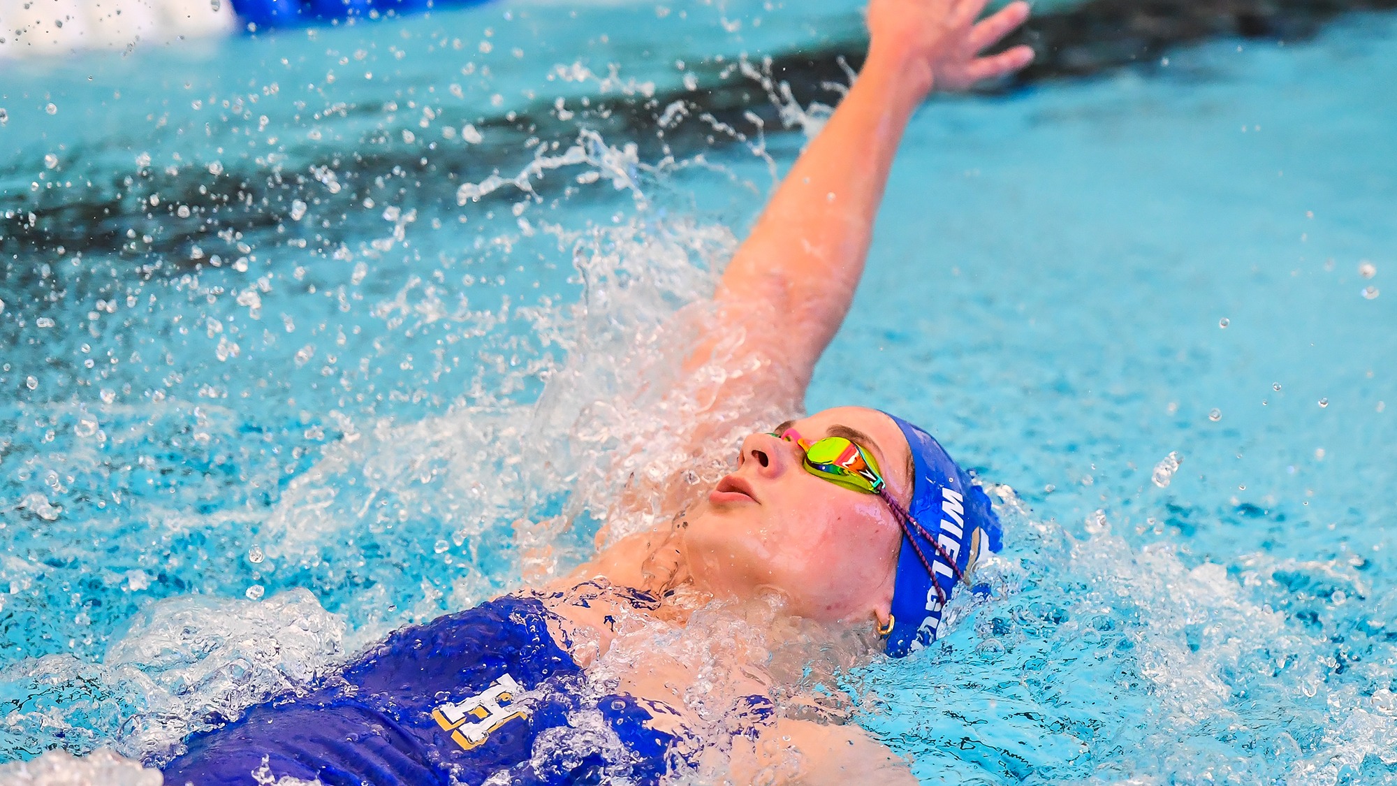 Paige Wielgus does the backstroke during practice in January 2025