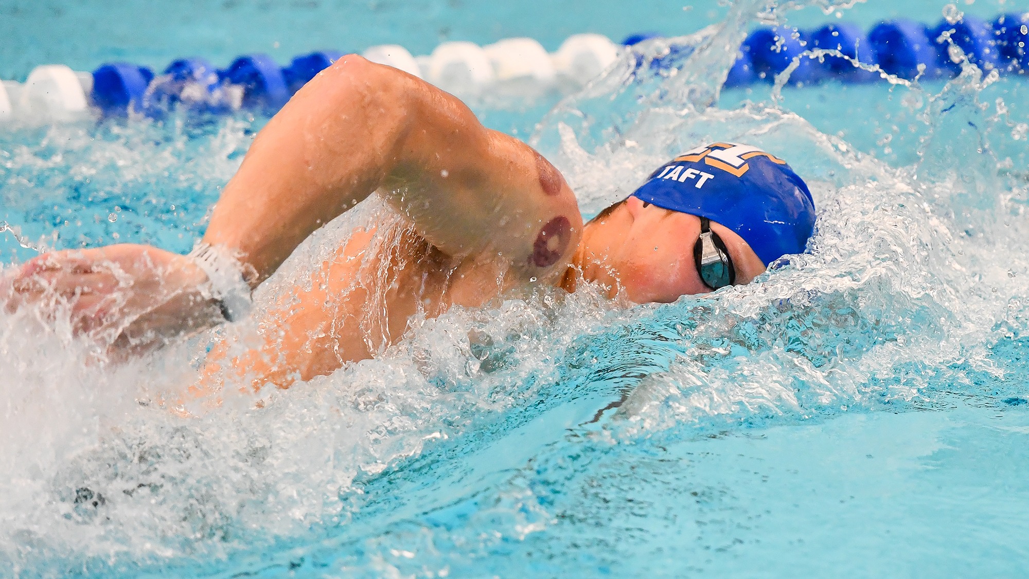 Nathaniel Taft swims the freestyle at practice in January 2025