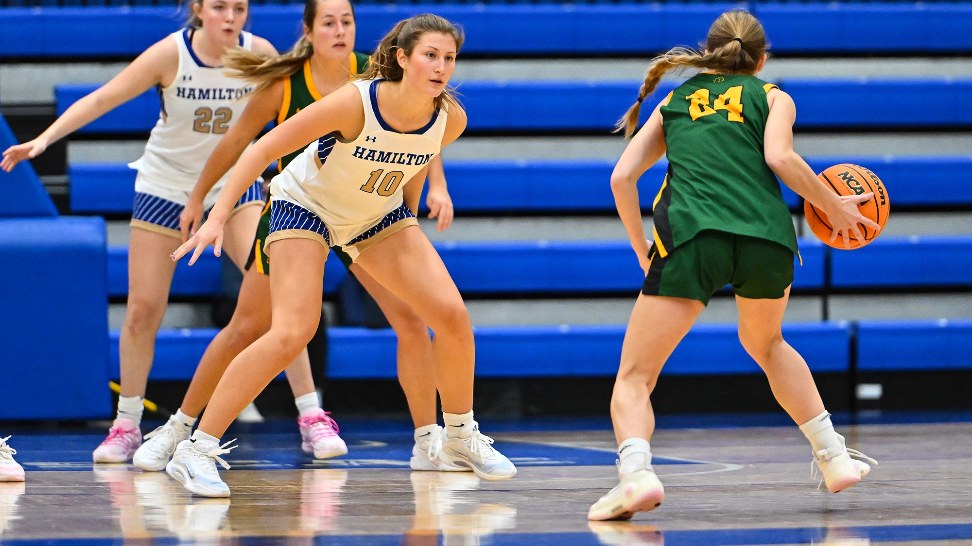 Abbey Schwoebel gets down in a defensive stance against SUNY Brockport in November 2025