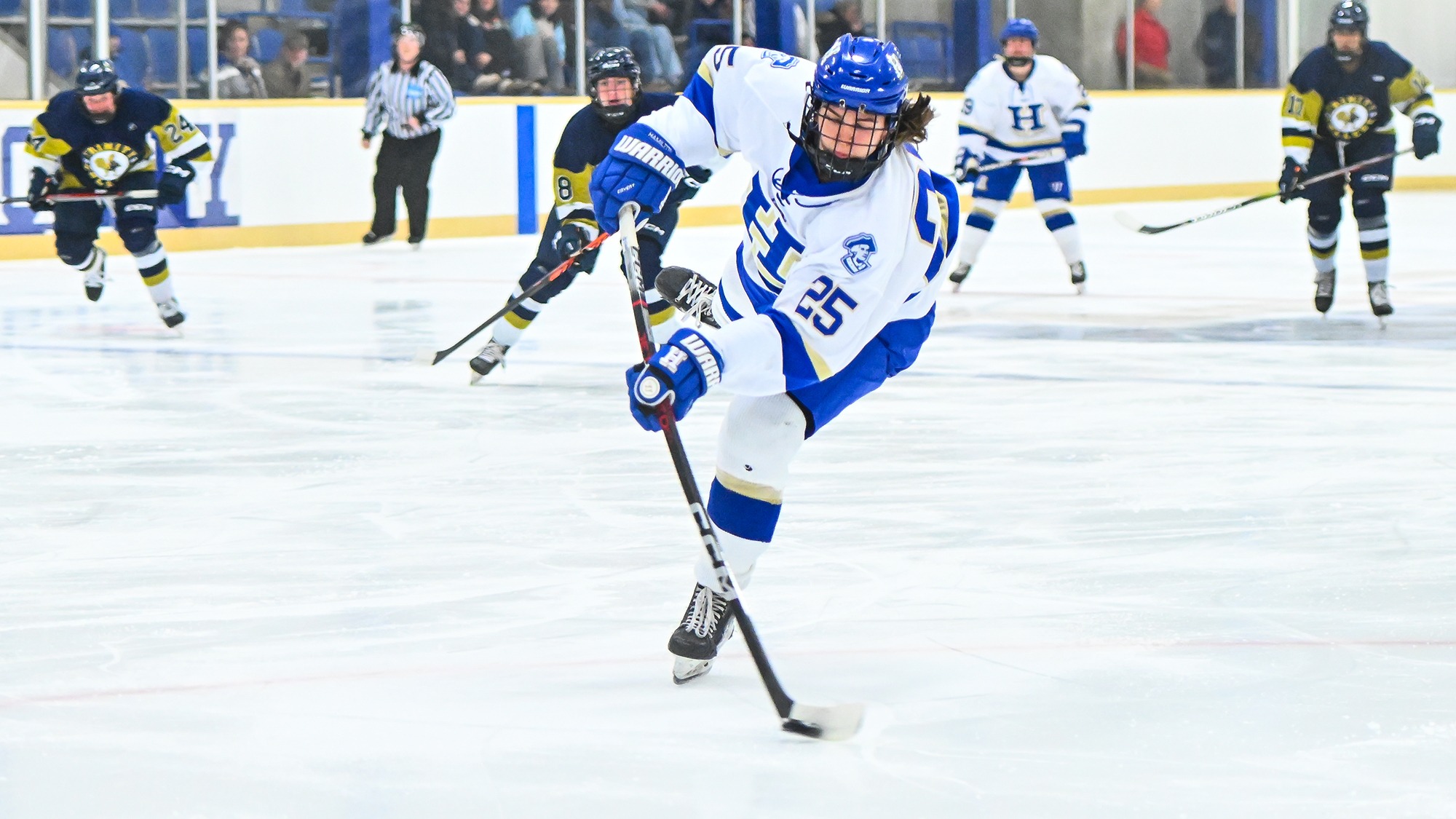 Sarah Myziuk '28 releases a wrist shot against Trinity in November 2025