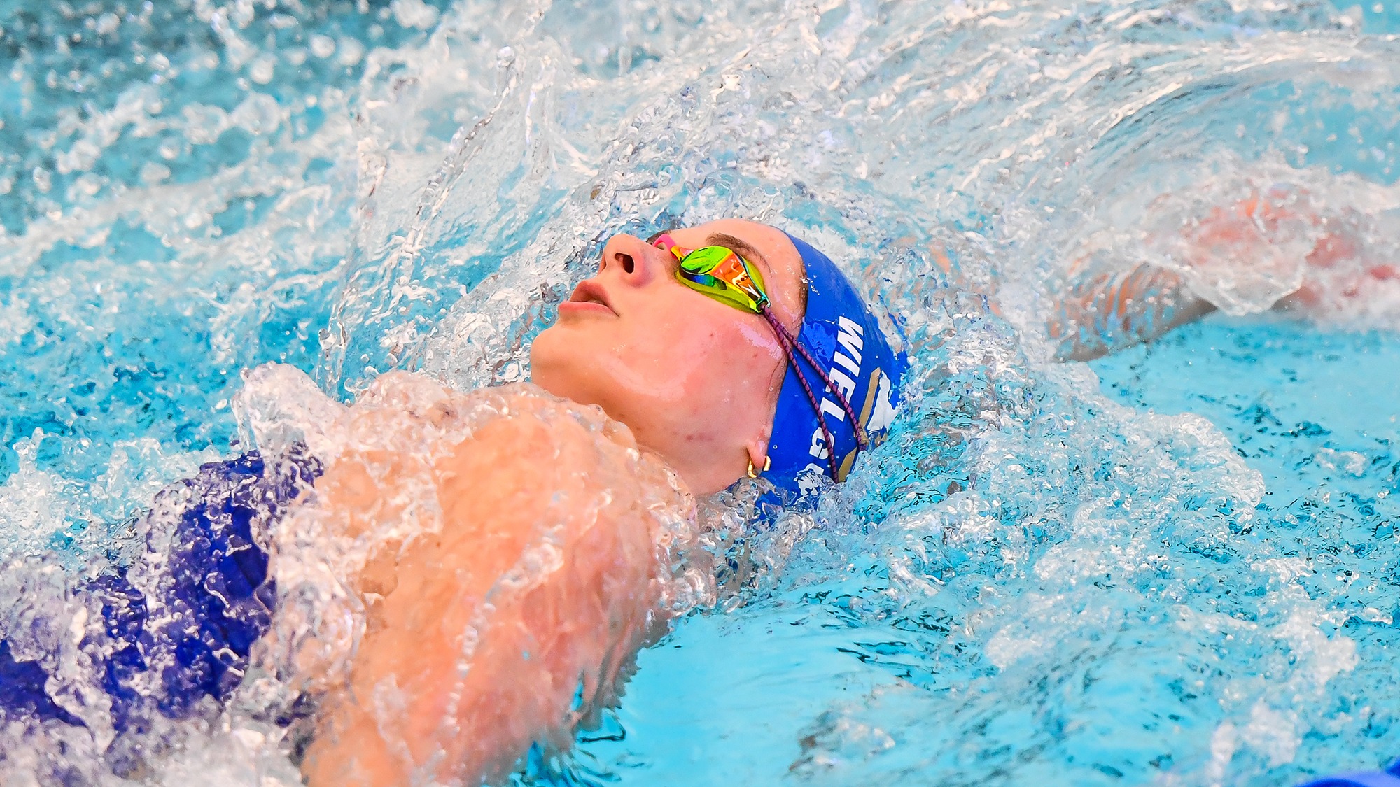 Paige Wielgus does the backstroke during practice in January 2025