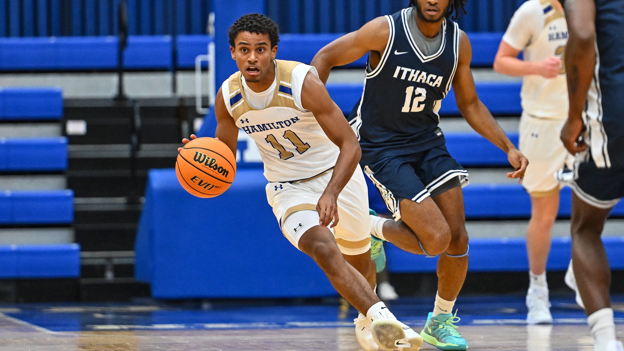 Matthew Rideout brings the ball up the court against Ithaca in November 2025