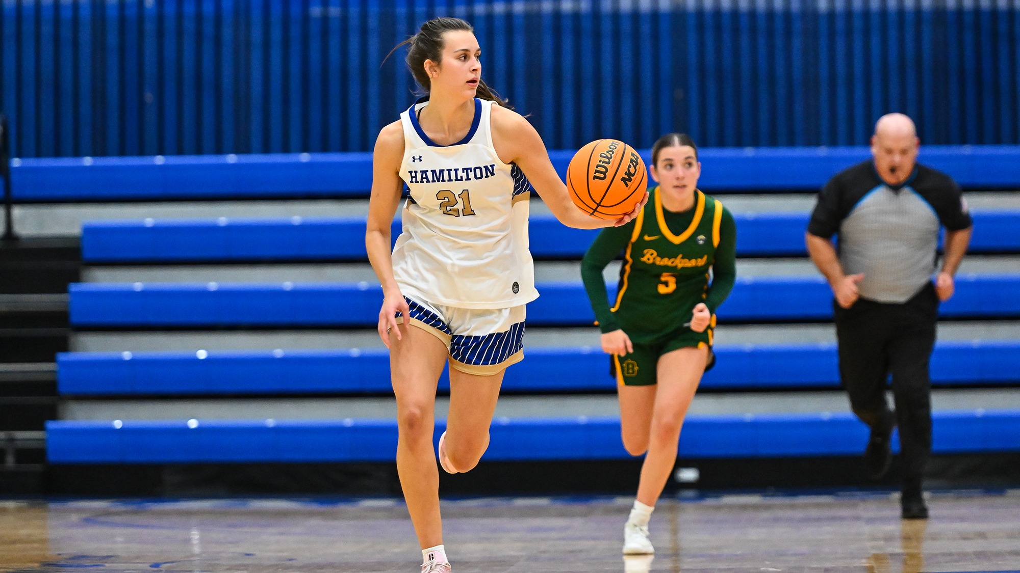 Kendall Harris brings the ball up the court against SUNY Brockport in November 2025