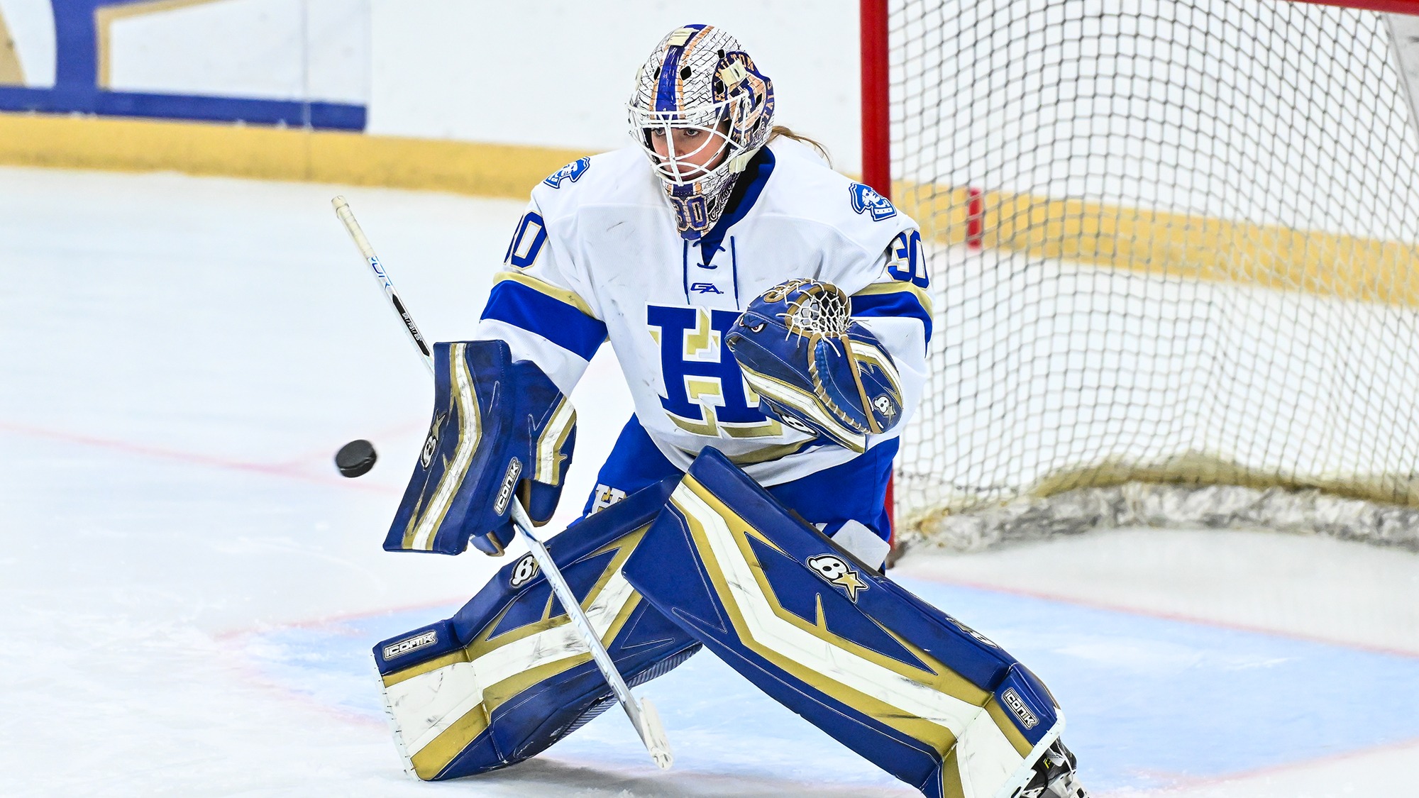 Goaltender Teagan Brown eyes the puck during warmups before the Trinity game in November 2025