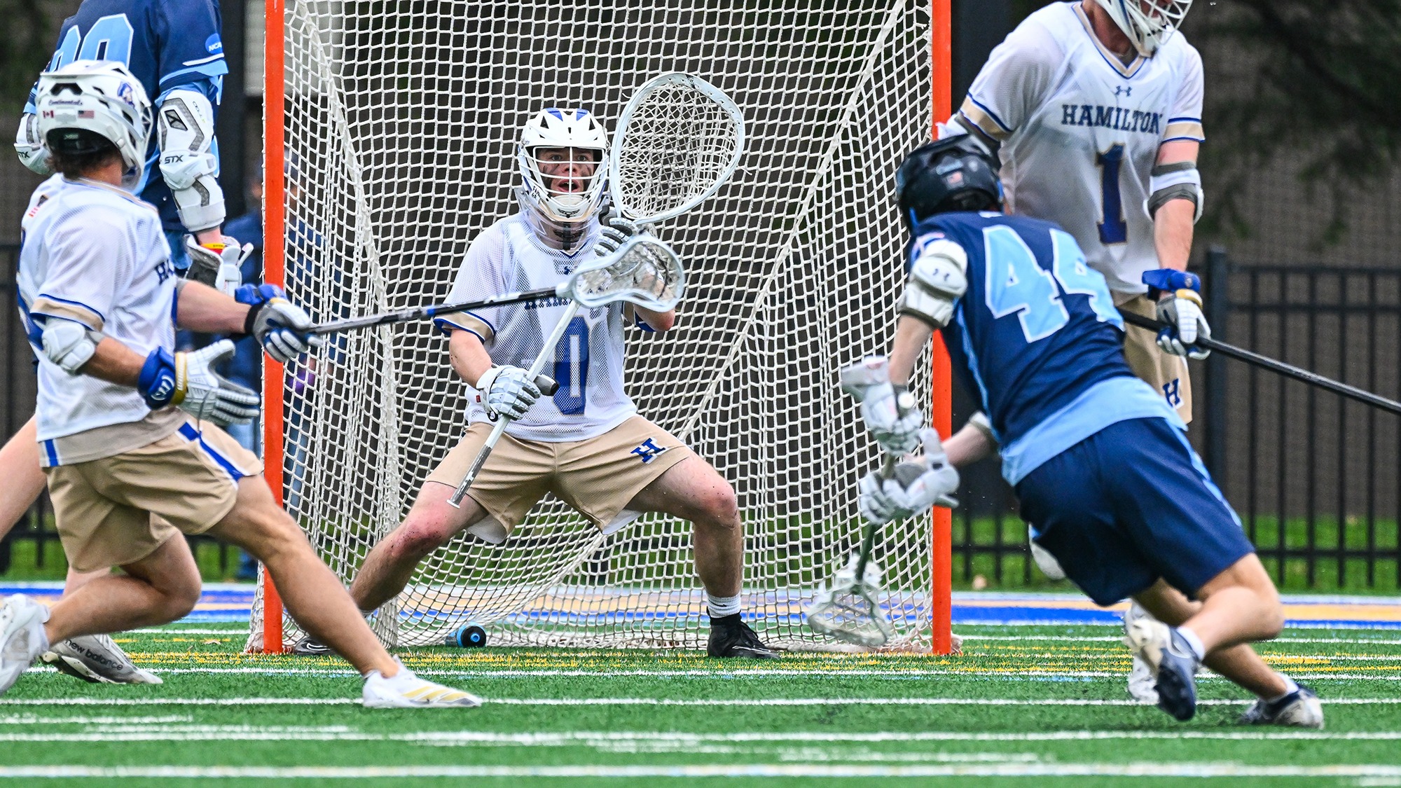 Men's lacrosse Goalie Jack Fried prepares to face a shot against Connecticut College in April 2025