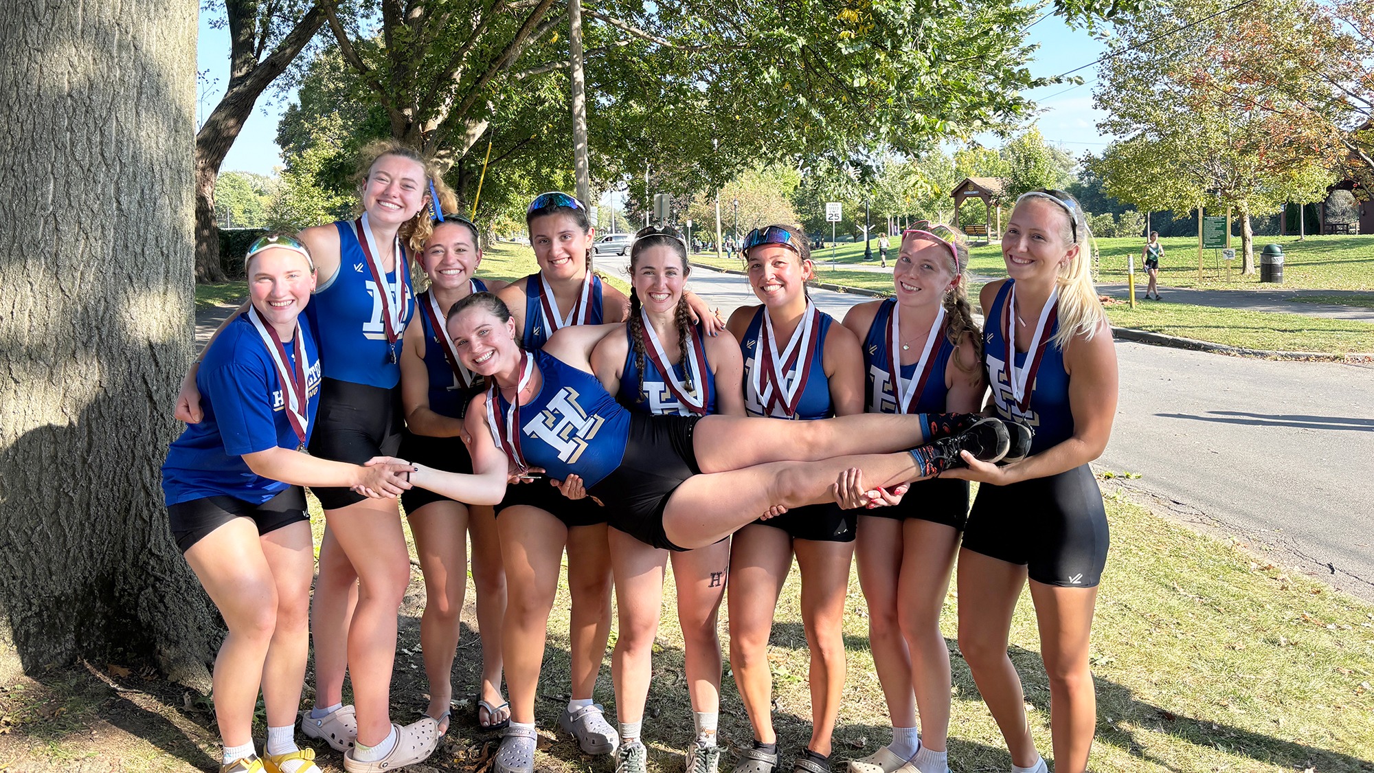 Members of the Women's Rowing team pose with their silver medals following the 2025 Mohawk Fall Classic