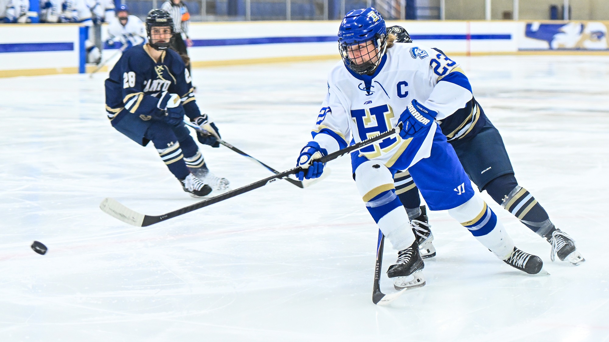 Grace Crowley puts a backhand shot on net early in the SUNY Canton game