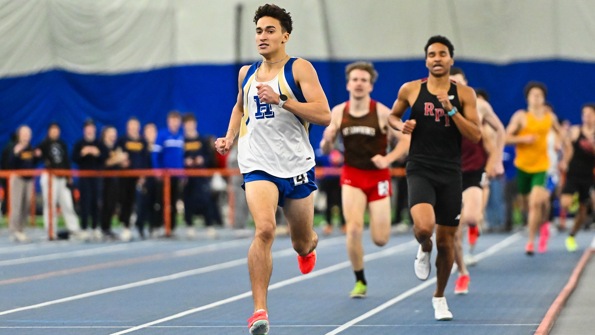 Luke Ferraiolo leads the pack in the 800-meter run at the 2026 Utica Winter Opener