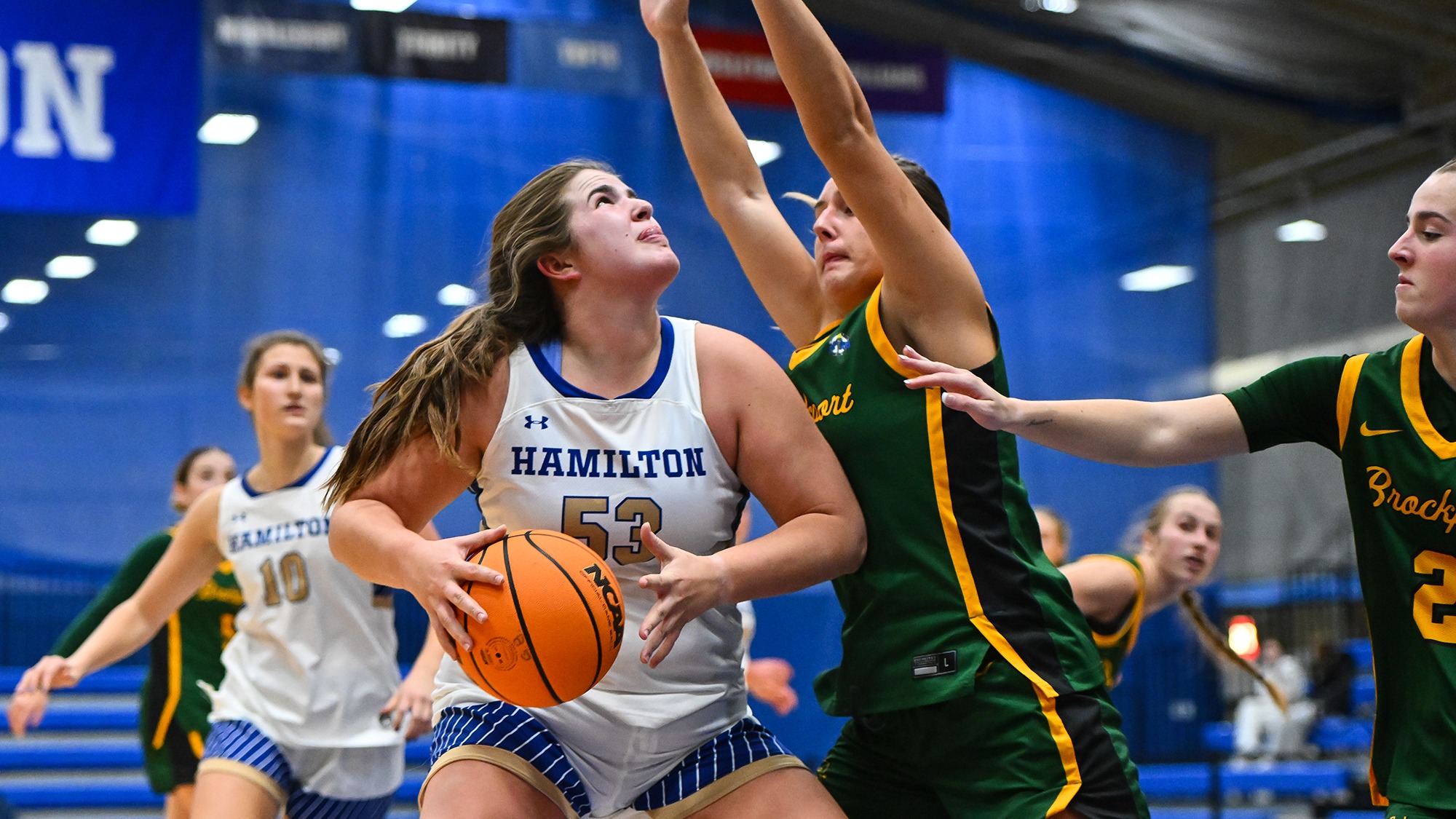 Taylor Lambo thinks about putting up a shot in the paint against SUNY Brockport in November 2025