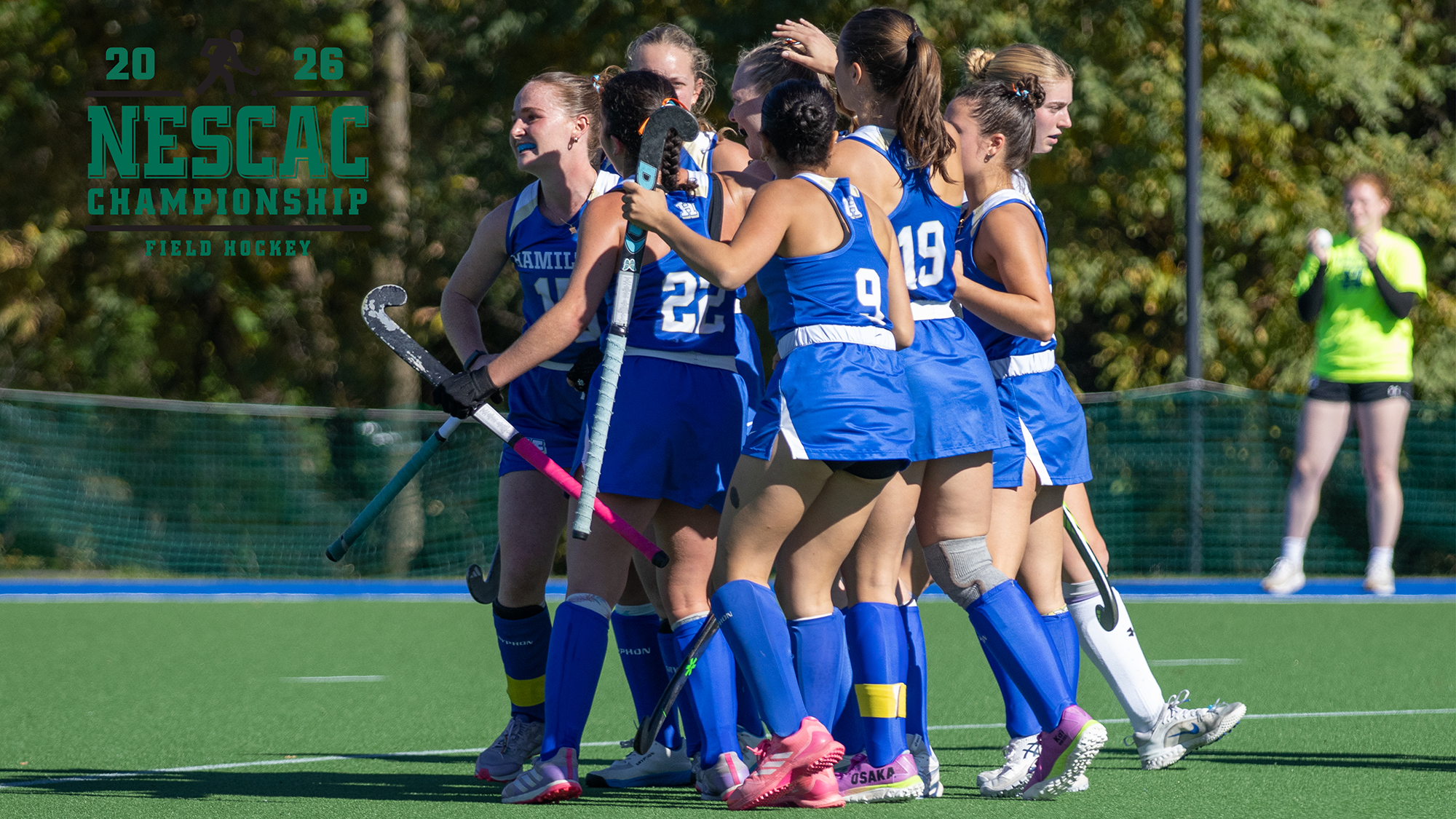 Field Hockey players celebrate a goal