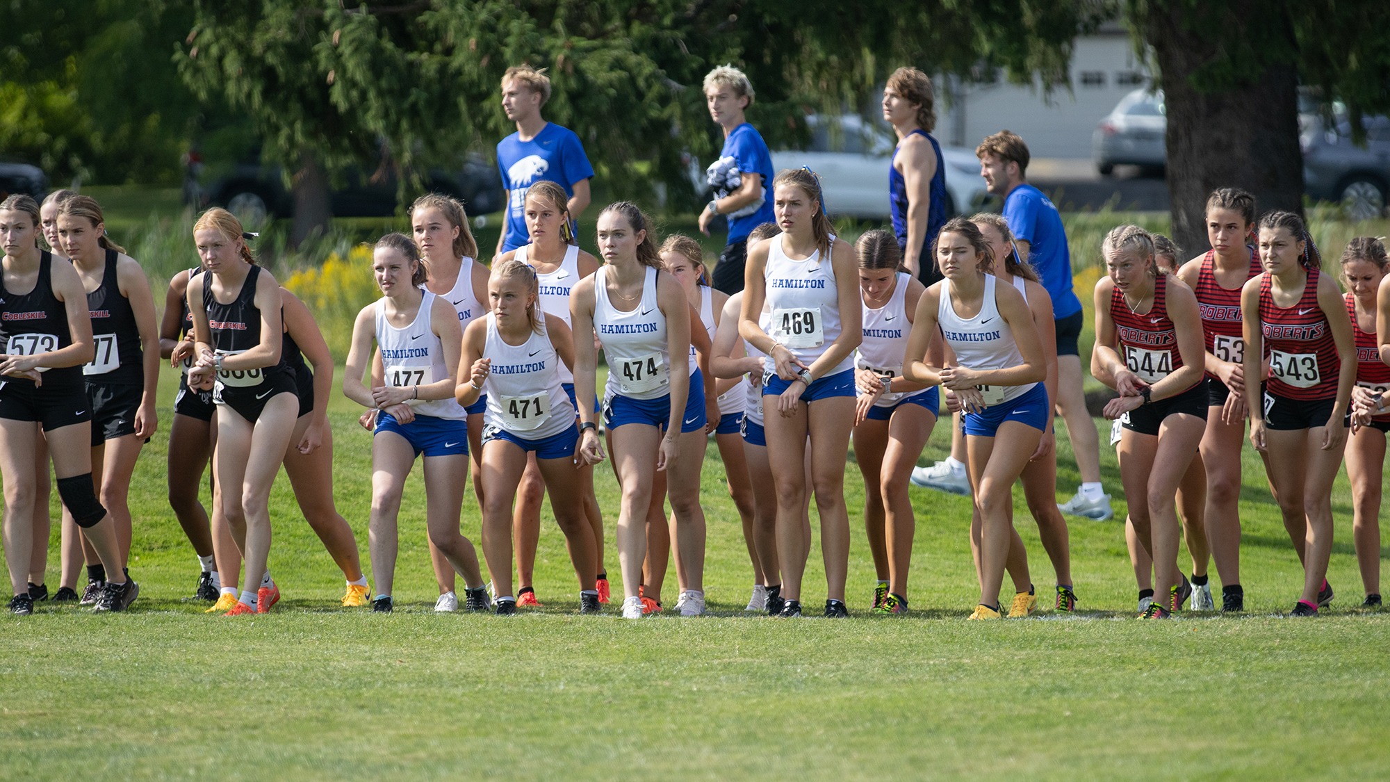 Women's cross country runners wait for the starting gun to go off before the Hamilton Short Course Invite