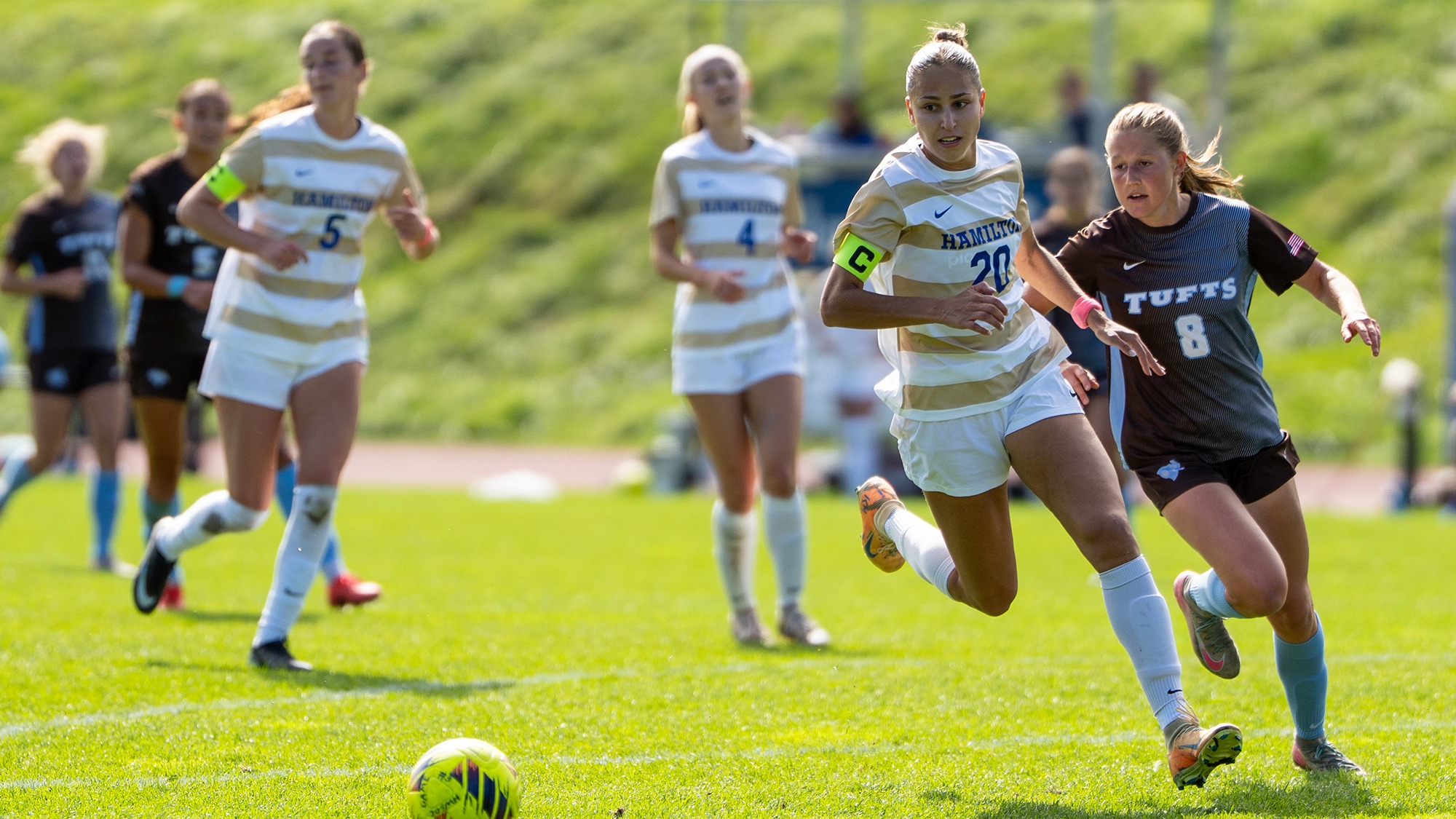 Abby Douglass pursues the soccer ball in a match against Tufts