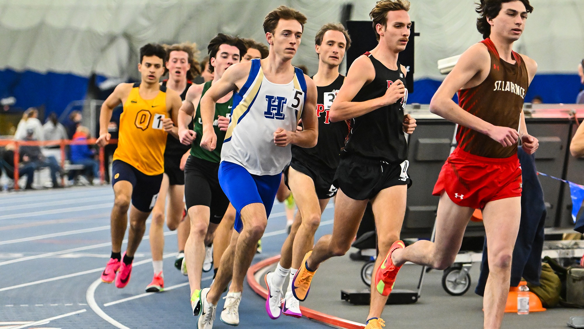 Jack Quinn moves up through the pack in the 3,000-meter run at the Utica University Winter Opener