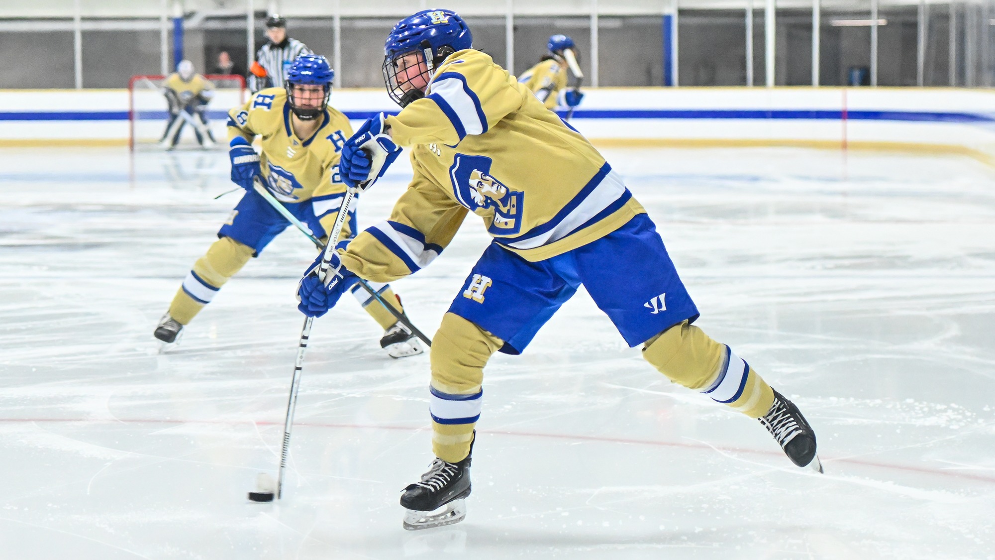 Grace Crowley takes a wrist shot against Connecticut College