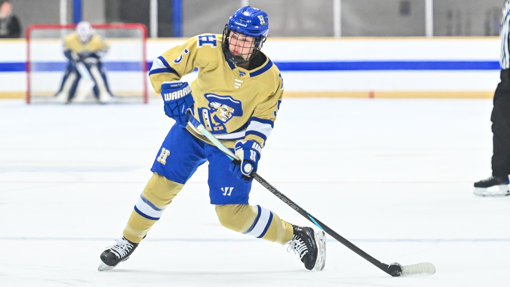 Brooke Heck releases a wrist shot from the blue line against Connecticut College