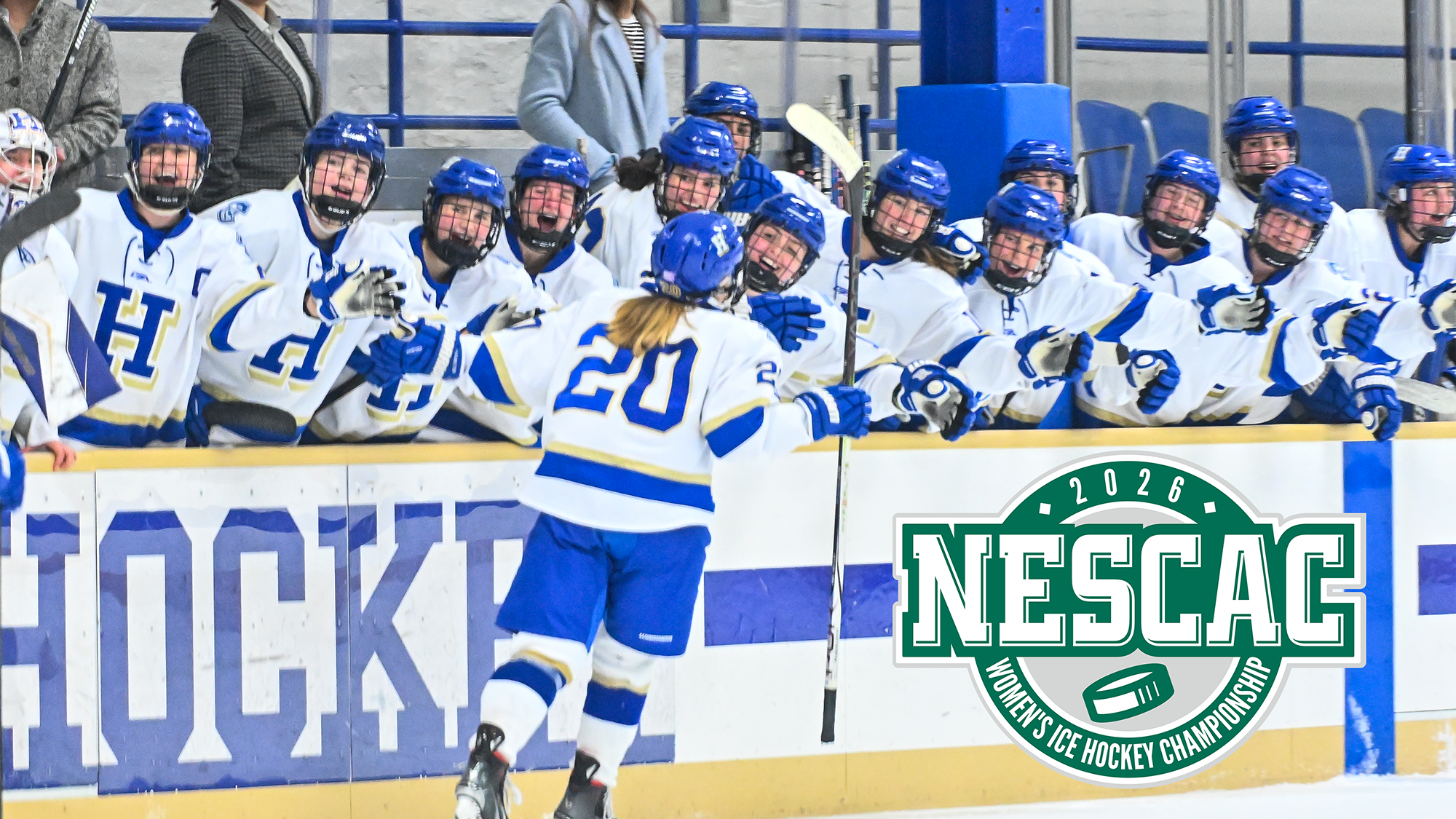 Women's Hockey player Lilly Truchon is congratulated at the team bench after scoring a goal