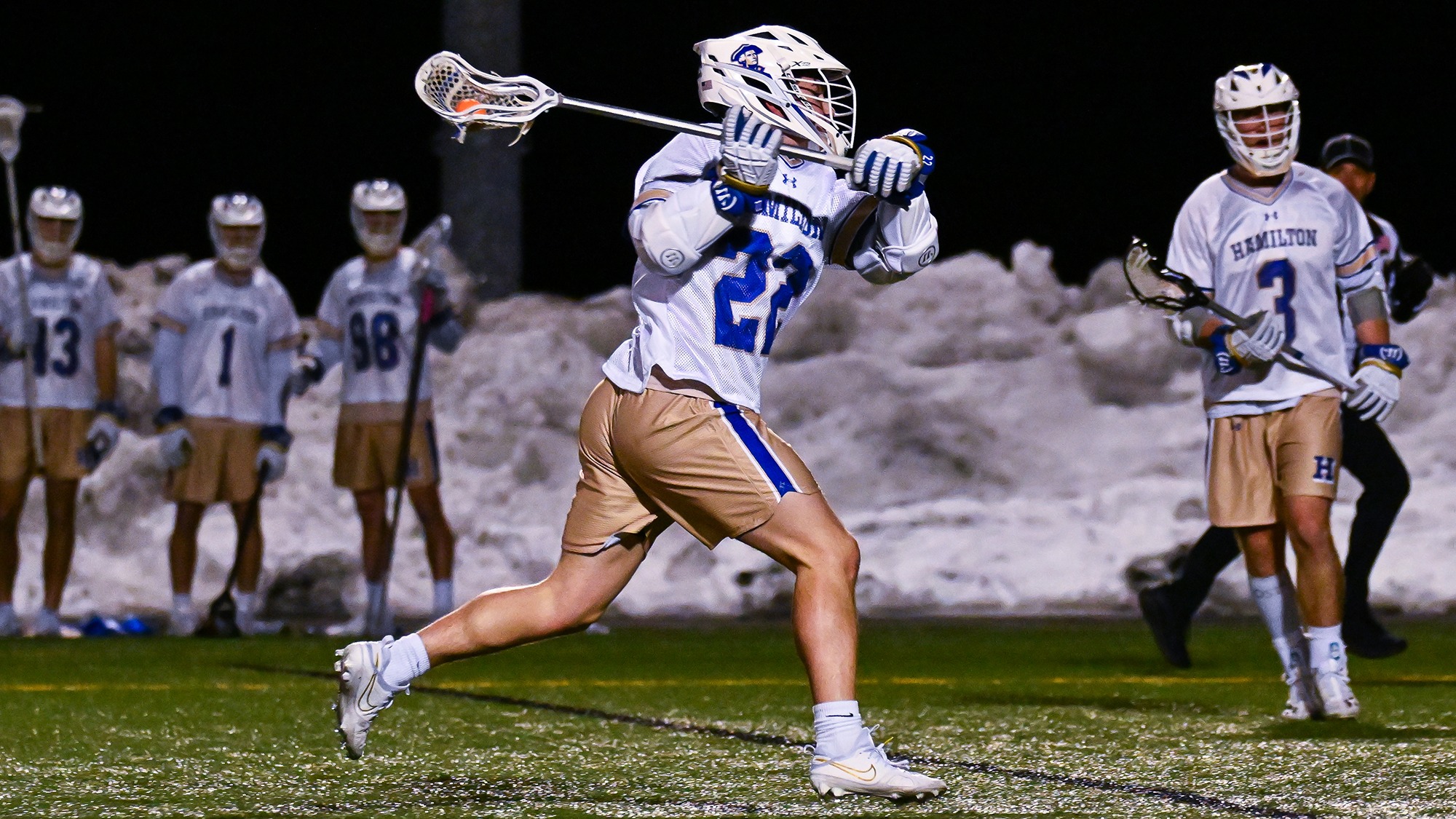 David Petz winds up to take a shot in a men's lacrosse game against Utica
