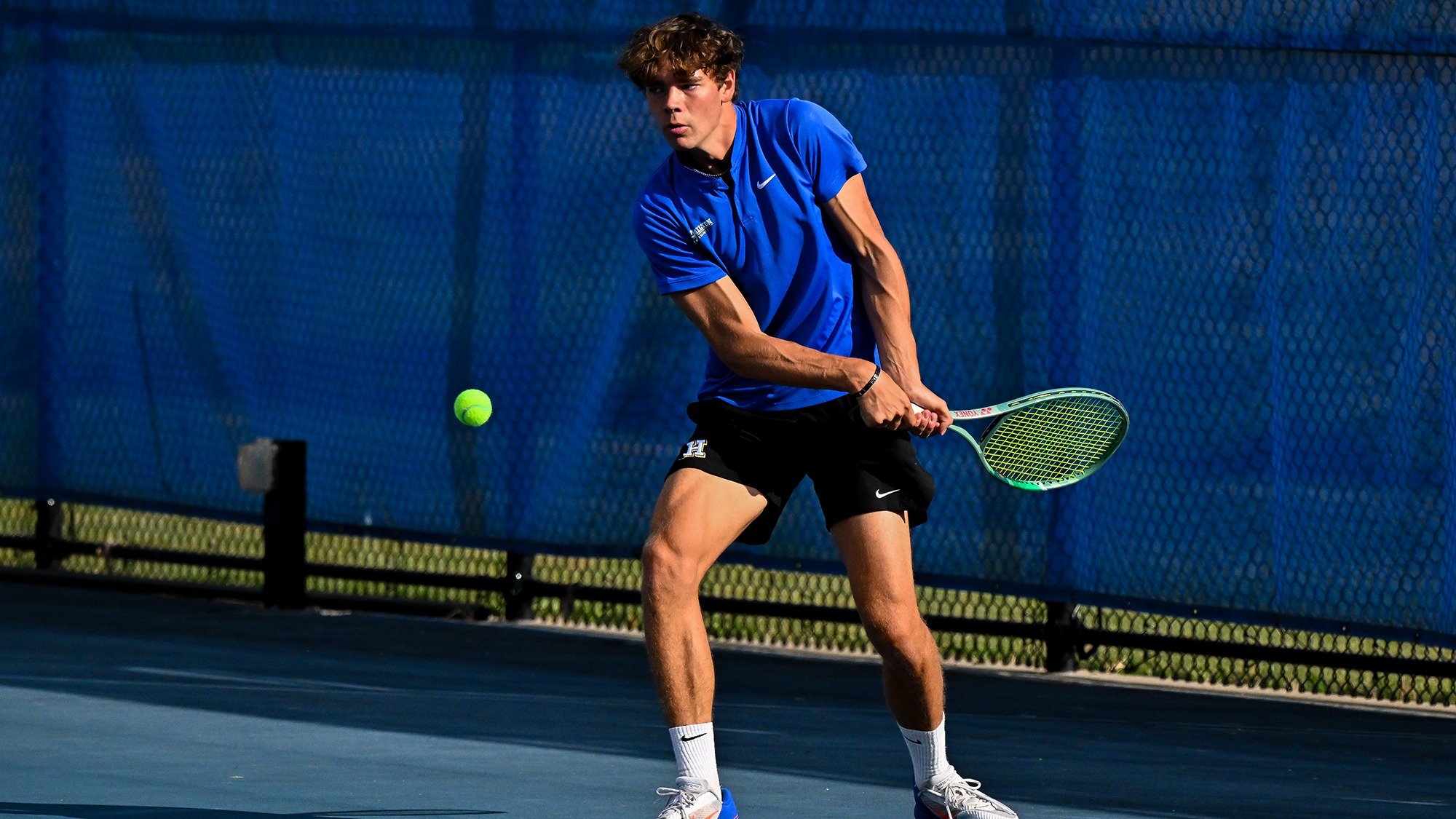Eerik Villem Aadamsoo hits a backhand return during men's tennis practice in September 2025