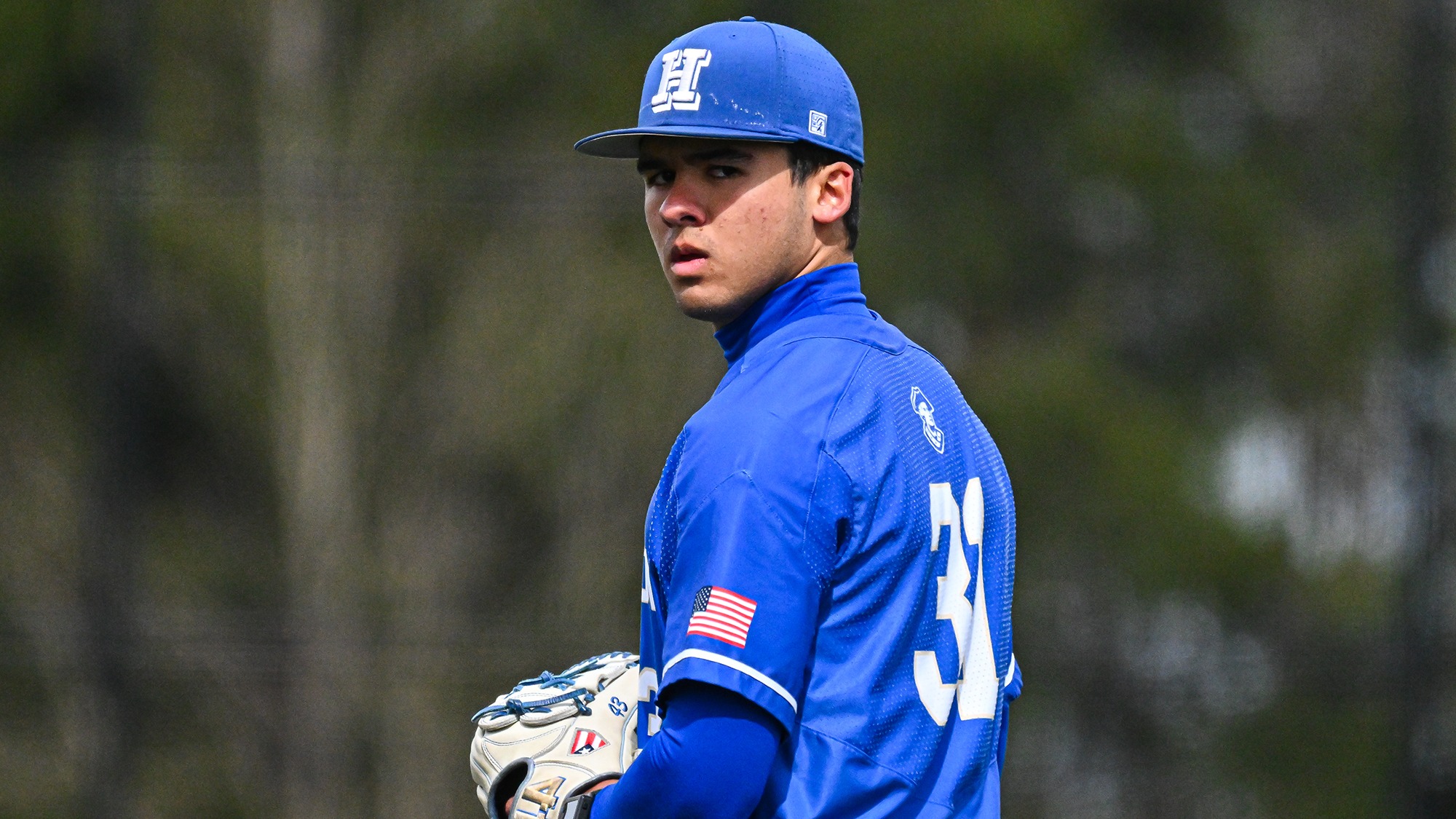 Mark Kovach looks in for the sign before he throws the next pitch in a baseball game against Williams