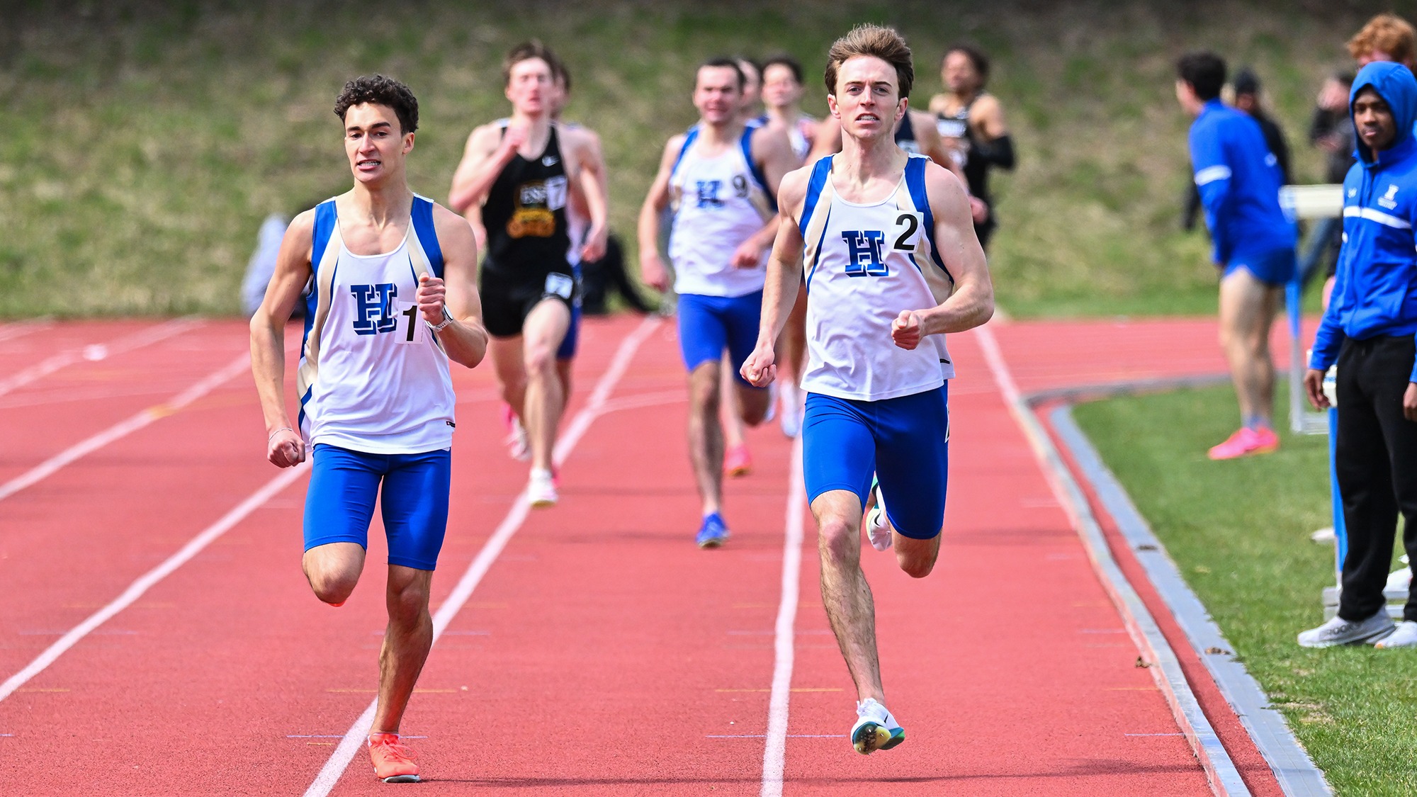 Luke Ferraiolo and Jack Quinn sprint for the finish line in the 800 meters in the 2026 Hamilton Outdoor Track and Field Invitational