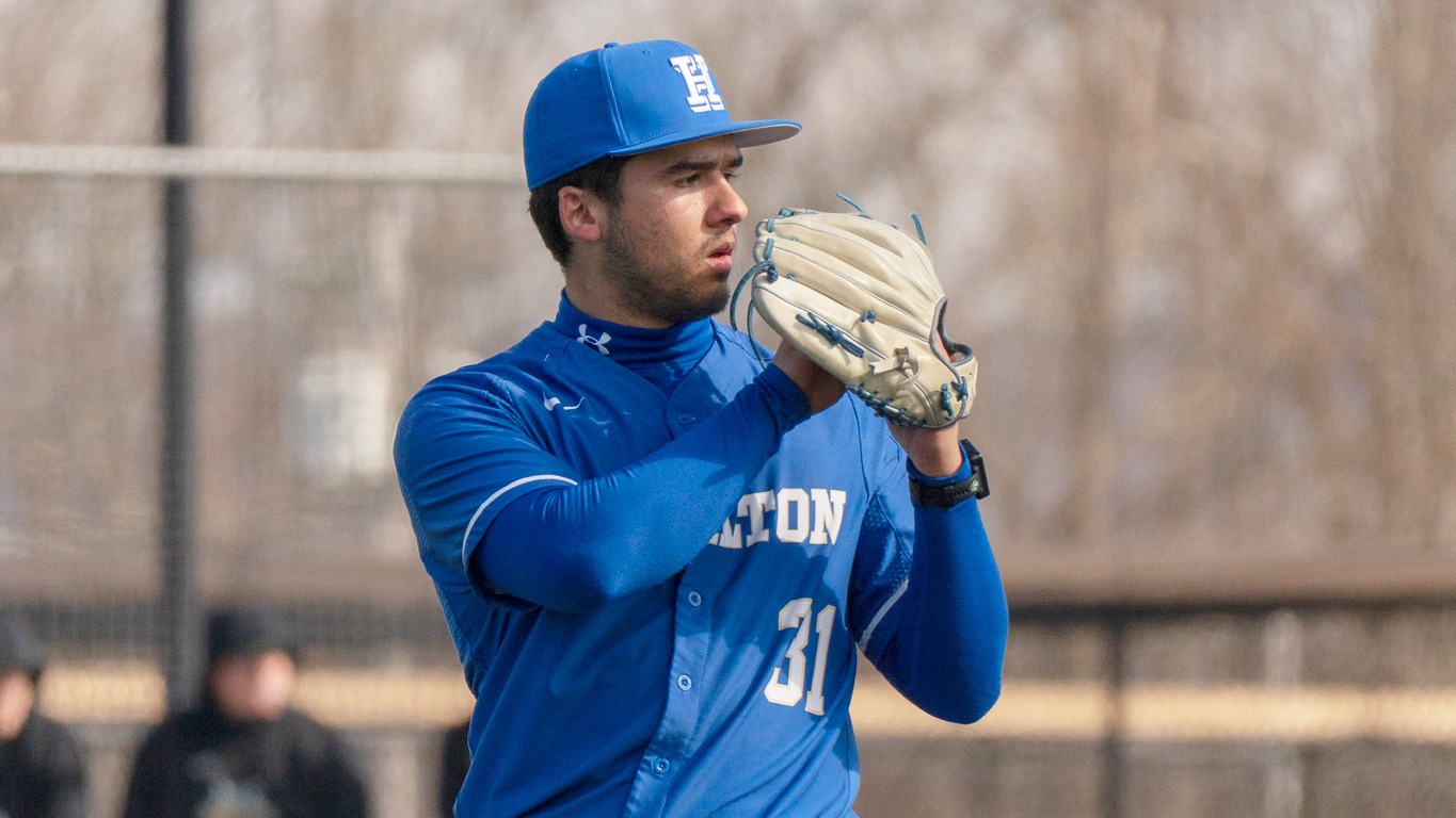 Baseball pitcher Mark Kovach goes into his windup in a 2026 game against SUNY Oswego