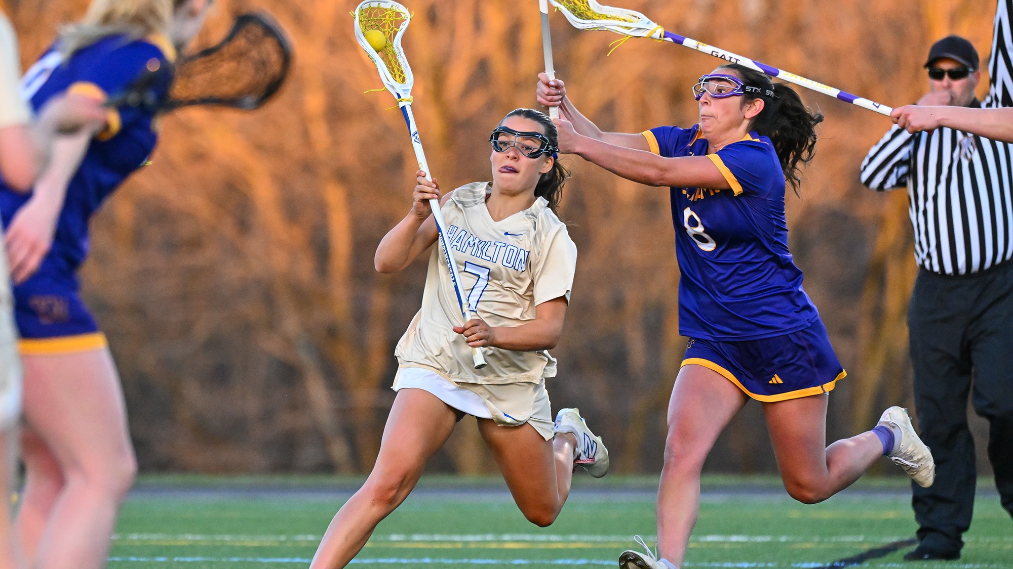 Maddigan Leifer weaves her way through Williams women's lacrosse defenders on Withiam Field