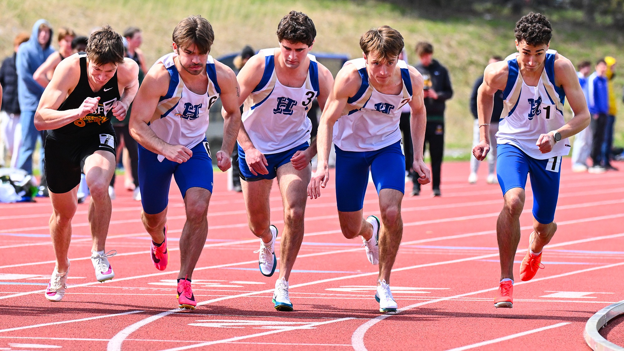 Four Men's Track and Field athletes start running in the 800 meters in the 2026 Hamilton Outdoor Invitational