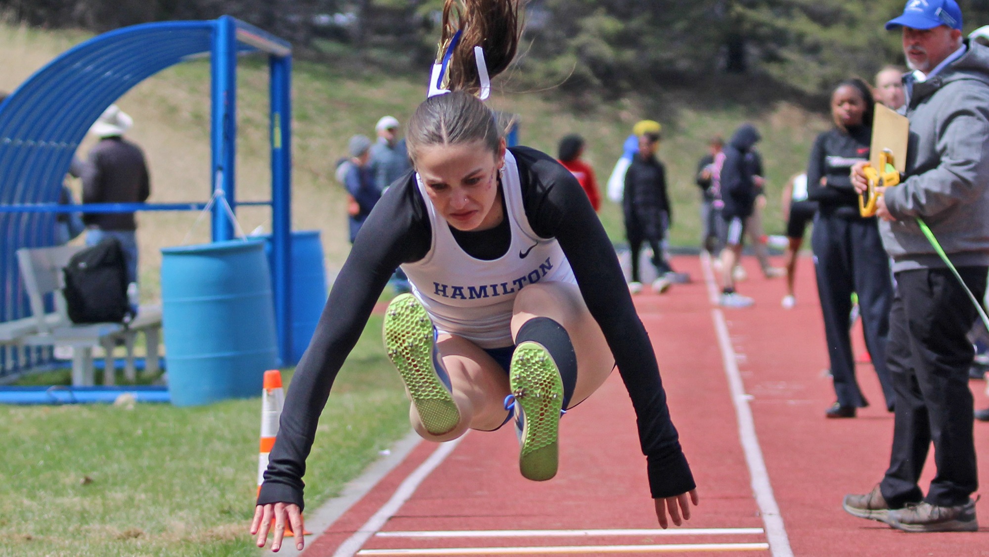 Emmeline Stoetzel flies through the air in the long jump at the 2026 Hamilton Outdoor Track and Field Invitational