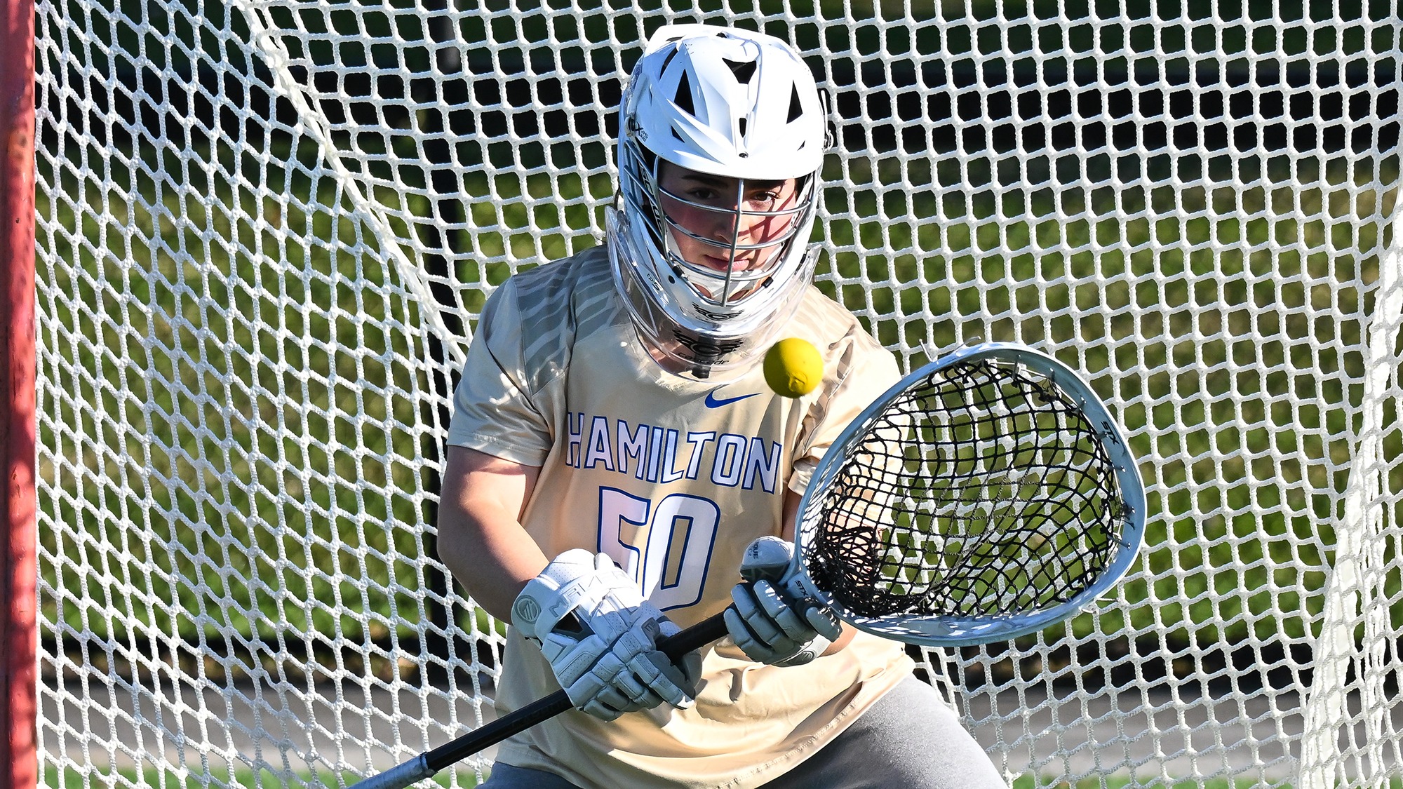 Eliza Schwarz looks the ball into her netting during women's lacrosse warmups before the 2026 Williams game